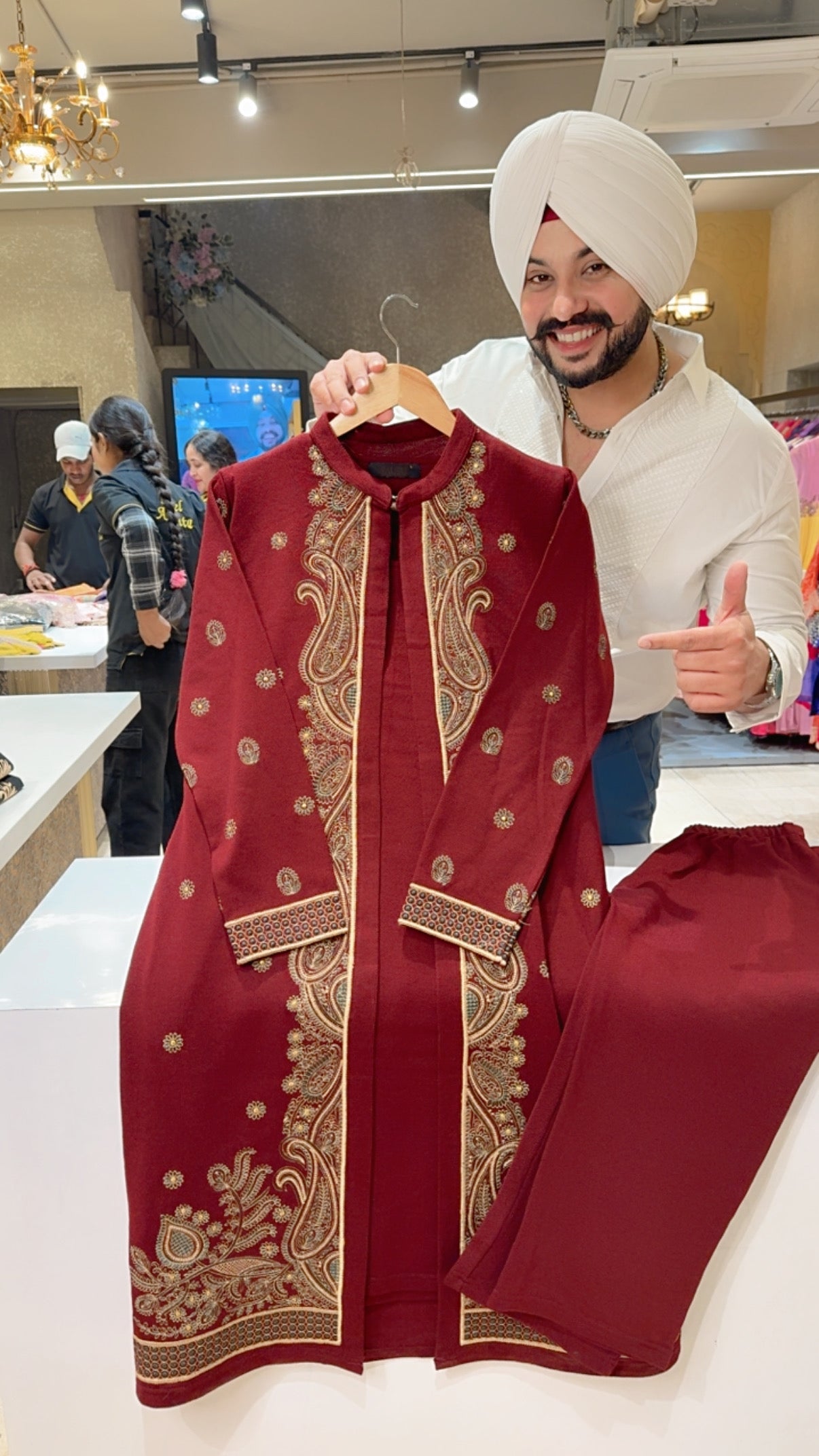 Maroon Woolen Long length Coord set With Heavy Embroidered Shrug