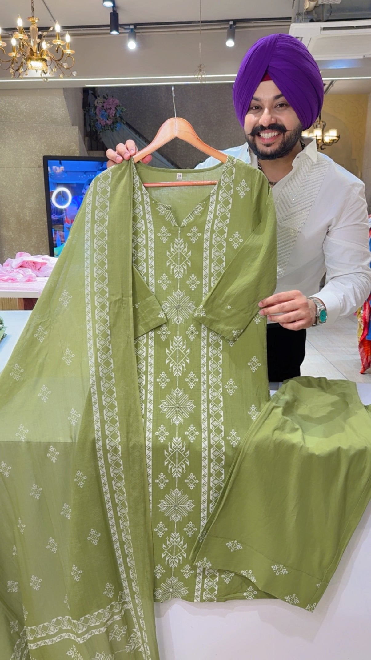 Olive Green pure Cotton Office Wear Suit with Sleek Hand embroidery work on it