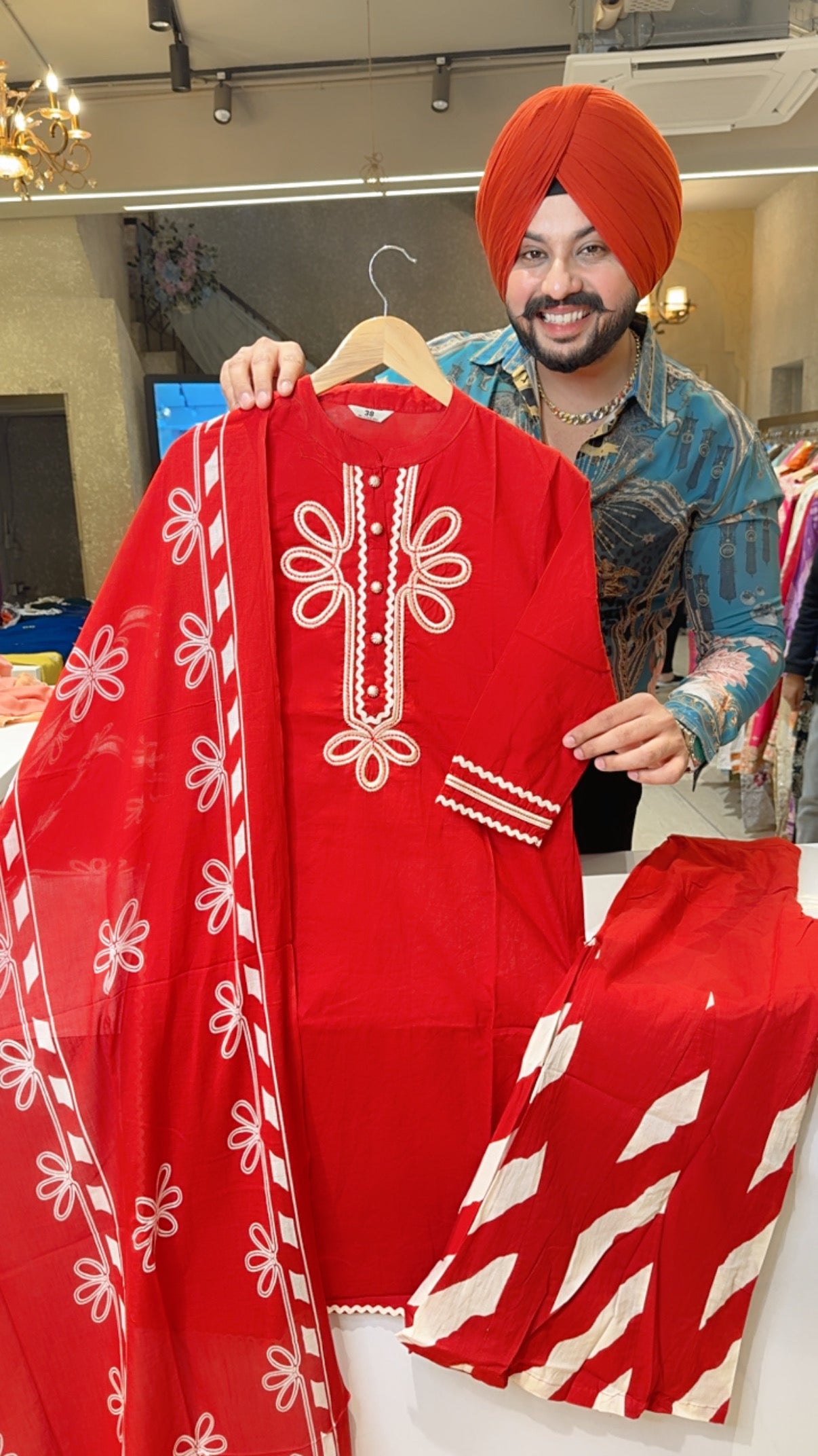 Rusty Red Pure Cotton Stylish Bell Botton Suit with Beautiful Embroidery work on neck