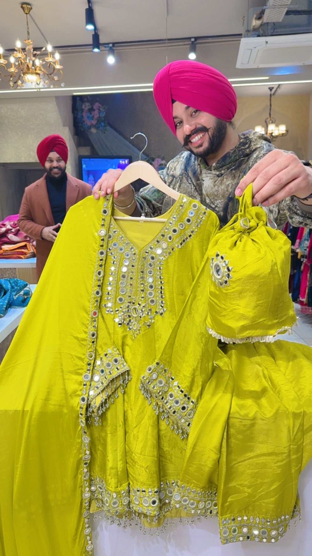 Fluorescent colour Textured Shimmer Silk Heavy Mirror Work Full Flair Farshi Salwar Suit with Cute Potli