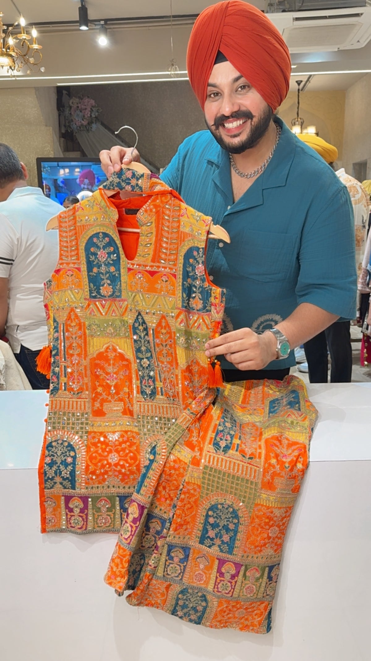 Orange Fully Front & Back Embroidered Broad High Slit Party Wear Bell Bottom Indo western Suit with Chokar Duppata