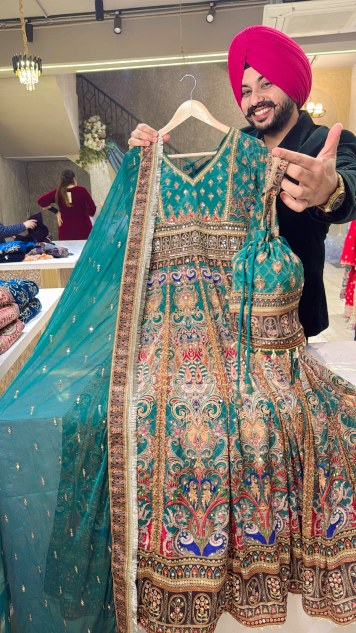 Leaf Green Crepe heavy embroidered Anarkali Gown with cute Potli & beautiful Duppata
