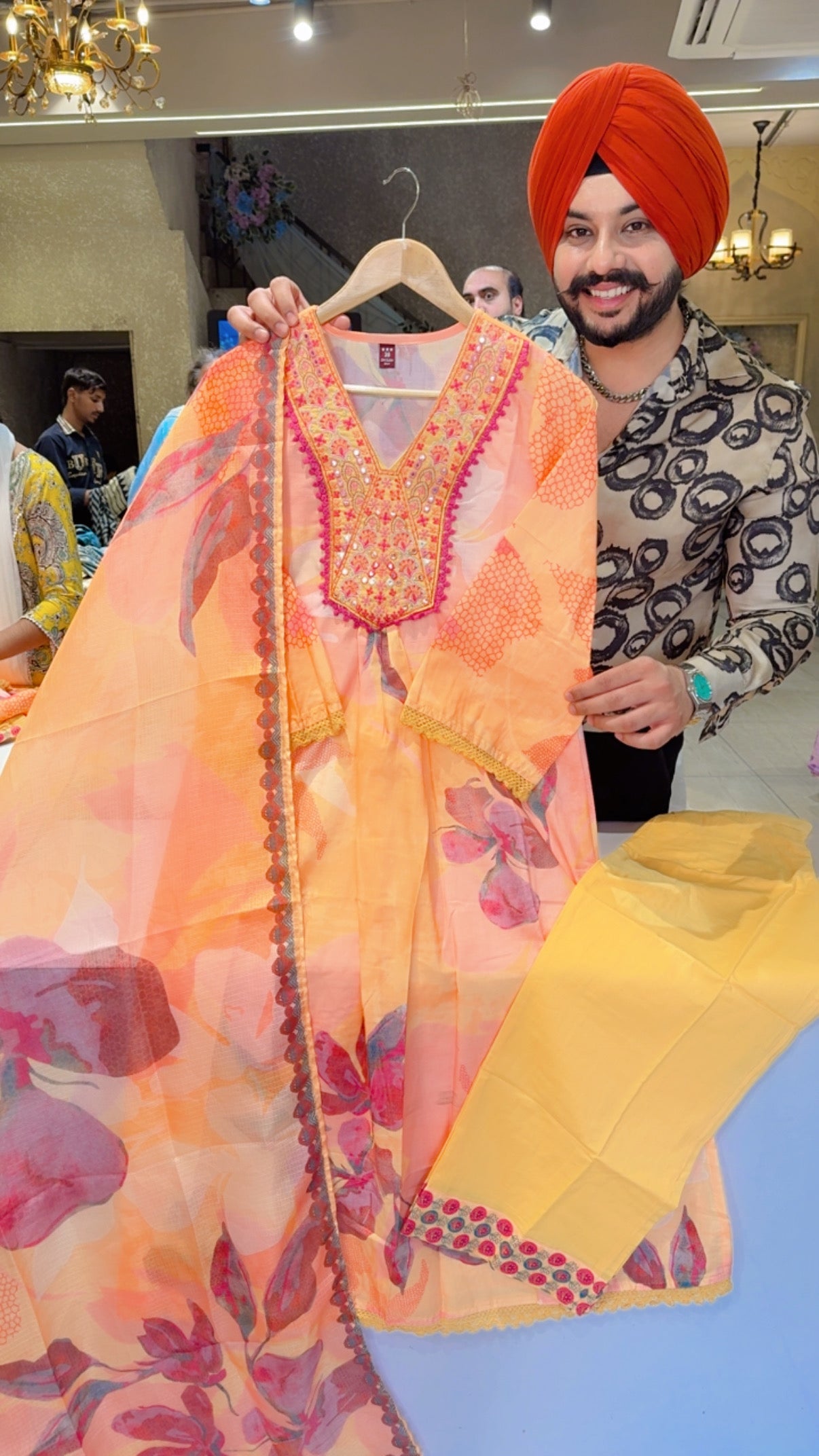 Yellow & Multicolored Embroidered A-line side Slit Suit with Beautiful Kota Doria Duppata