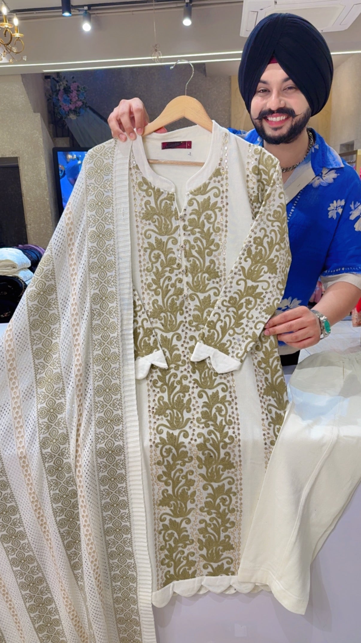 Off white Woolen Heavy embroidered Straight Suit with Beautiful Woolen Duppata