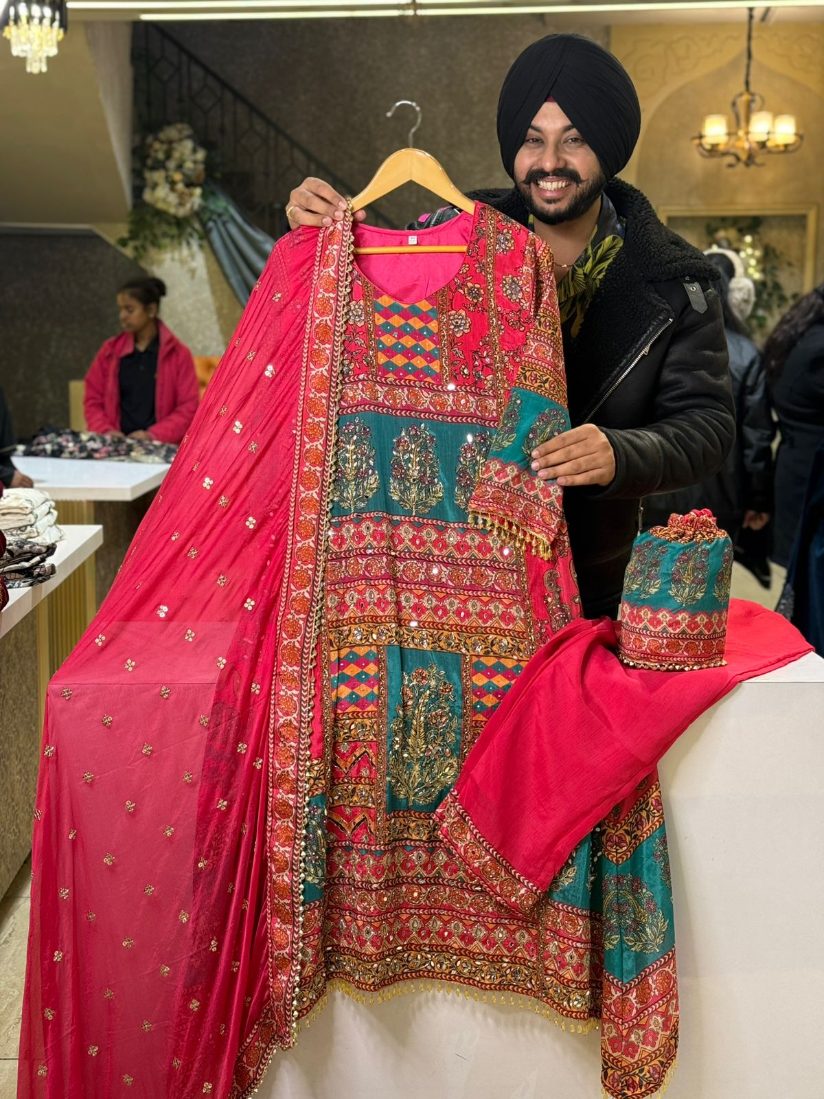 Rani & Rama Chinon Heavy Embroidered Pakistani A-line Suit with Potli