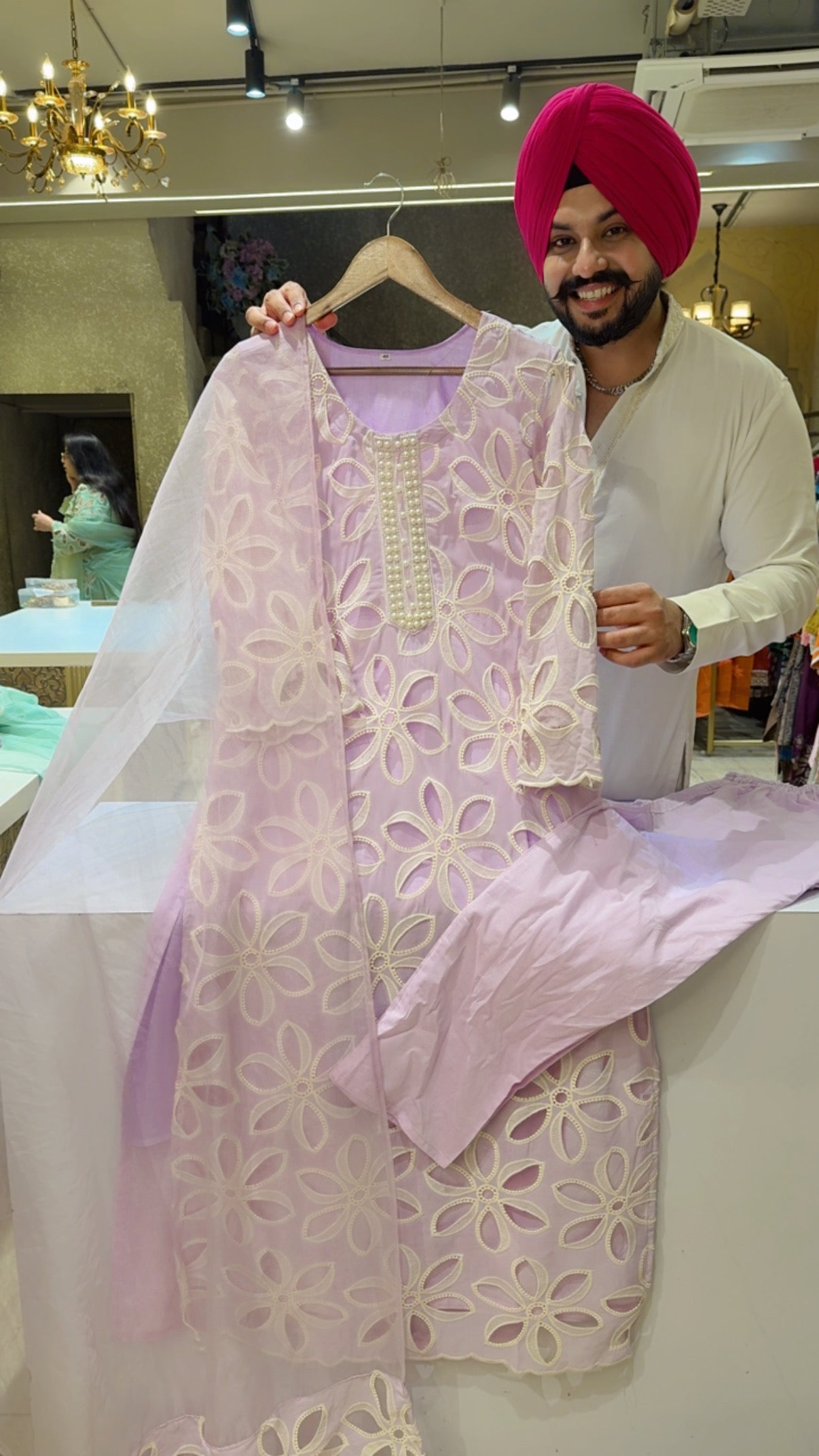 Lavender Soft Organza & Cotton
Designer Cutwork Straight Long Suits with Pearl work on
Neck