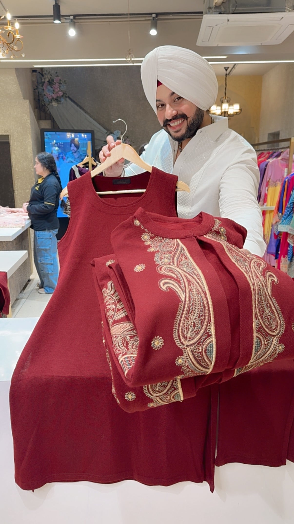 Maroon Woolen Long length Coord set With Heavy Embroidered Shrug