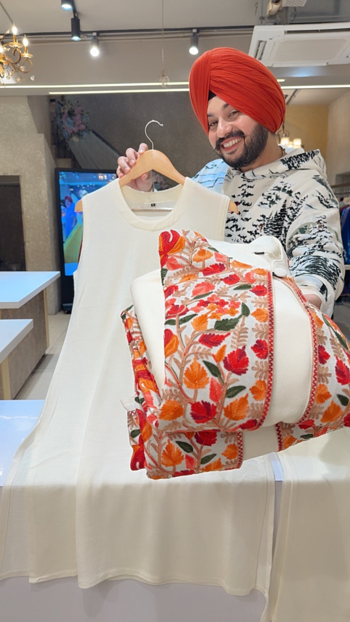 Moon White Woolen Long length Coord set With Heavy Embroidered Shrug