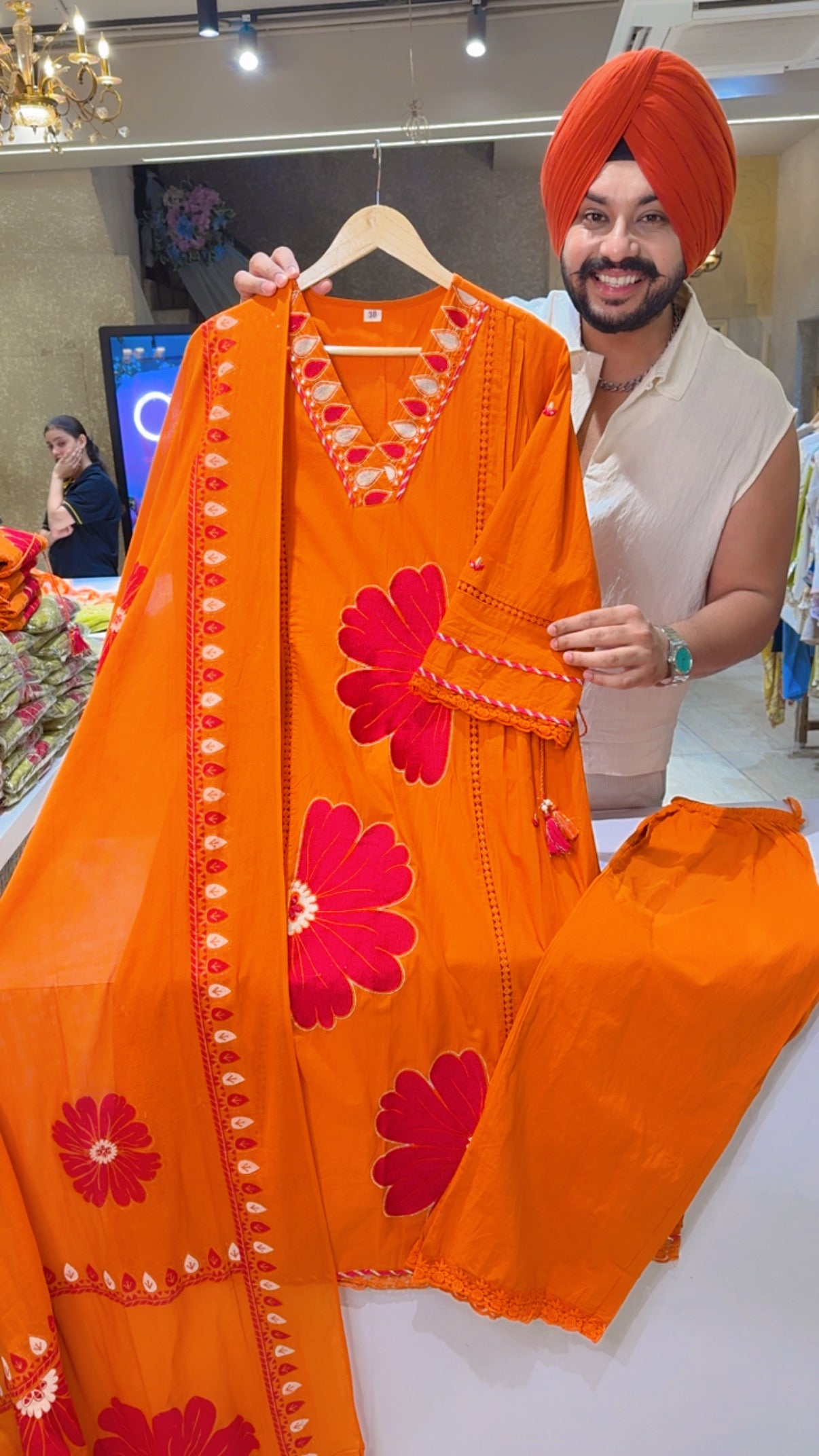 Orange Pure Cotton Floral Embroidered Side knot Semi Formal Suit with Beautiful Hand painted Duppata