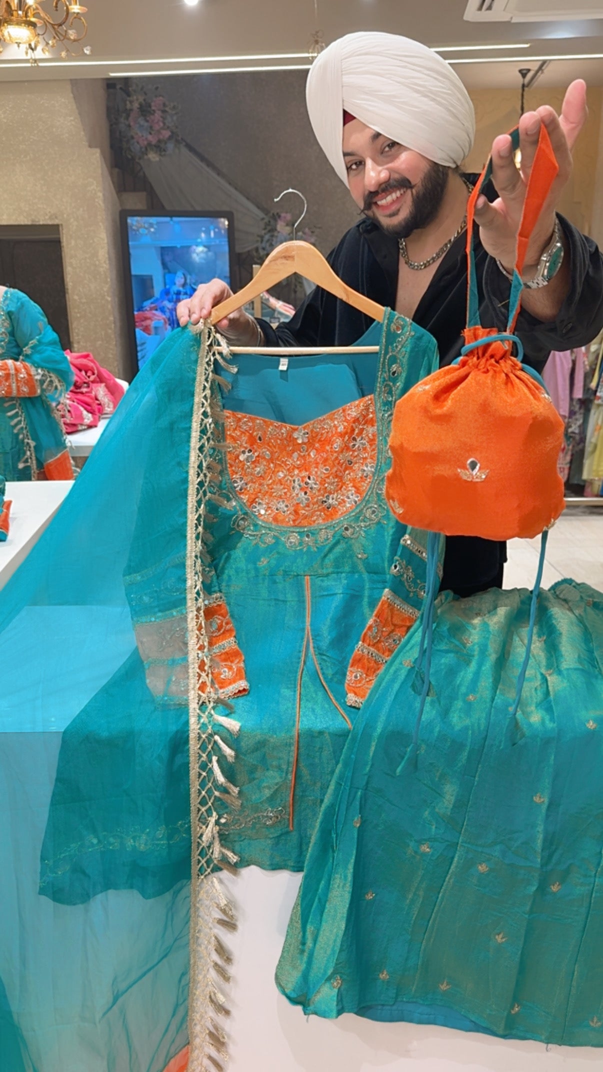 Sea Green Shimmer Silk Hand embroidered Front Slit Paplum Sharara Suit with Organza Duppata & Cute Potli