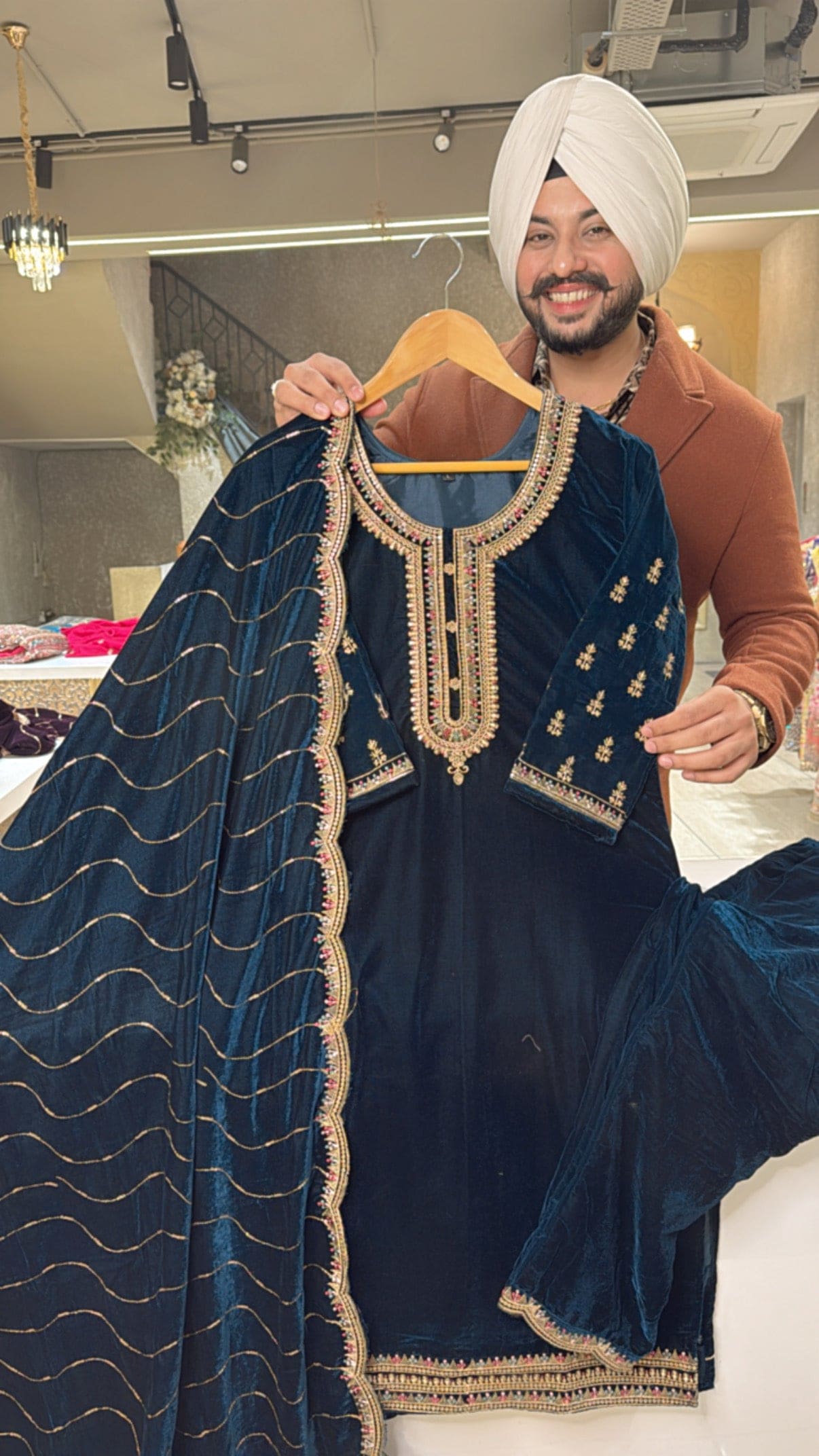 Teel Heavy velvet Straight Suit With Beautiful embroidery Work on neck Sleeves & Duppata