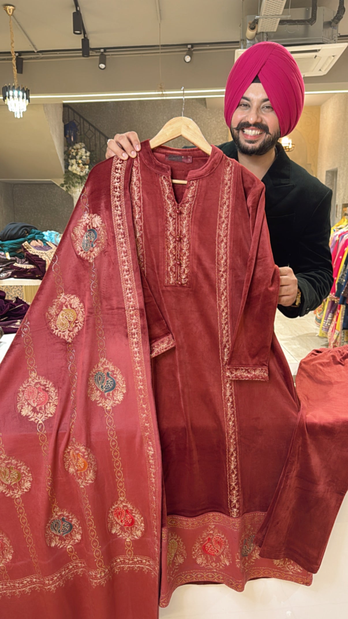 Rust Heavy velvet Fully Strechable A-line Suit with Heavy embroidered Duppata