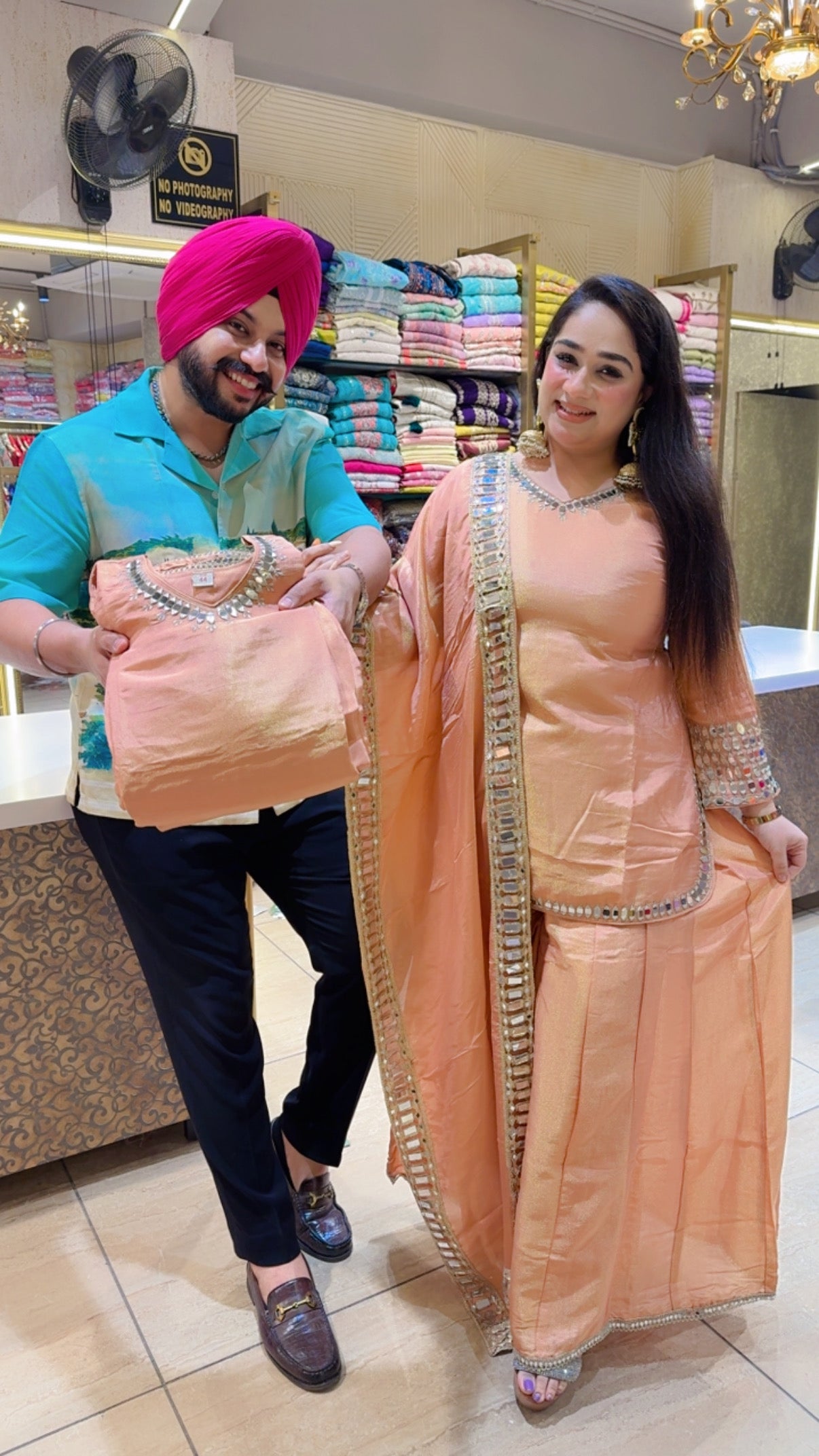 Peach Shimmer Silk Heavy mirror Work Apple cut Full Flair Sharara set with Heavy mirror work sleek Duppata