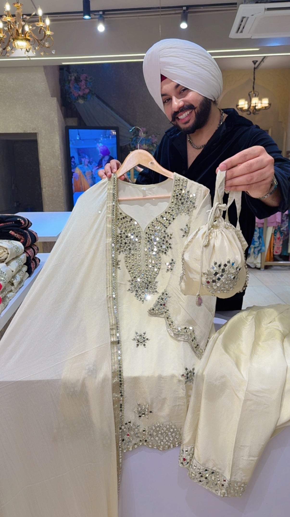 Off White Shimmer Silk Heavy mirror work PartyWear Salwar Suit with Cute Potli