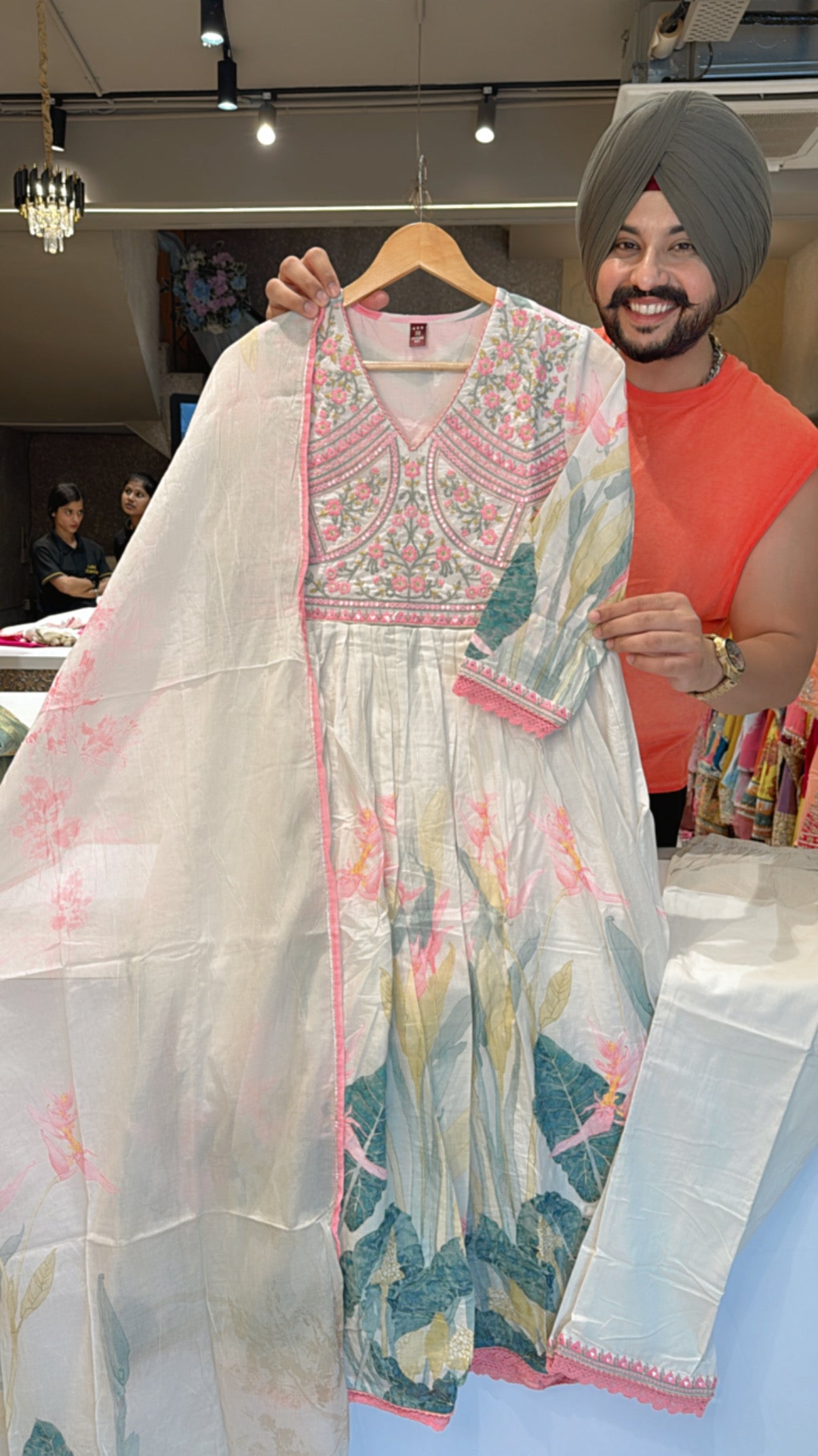 Off white Mal Cotton Anarkali suit with Beautiful embroidery Work on neck
