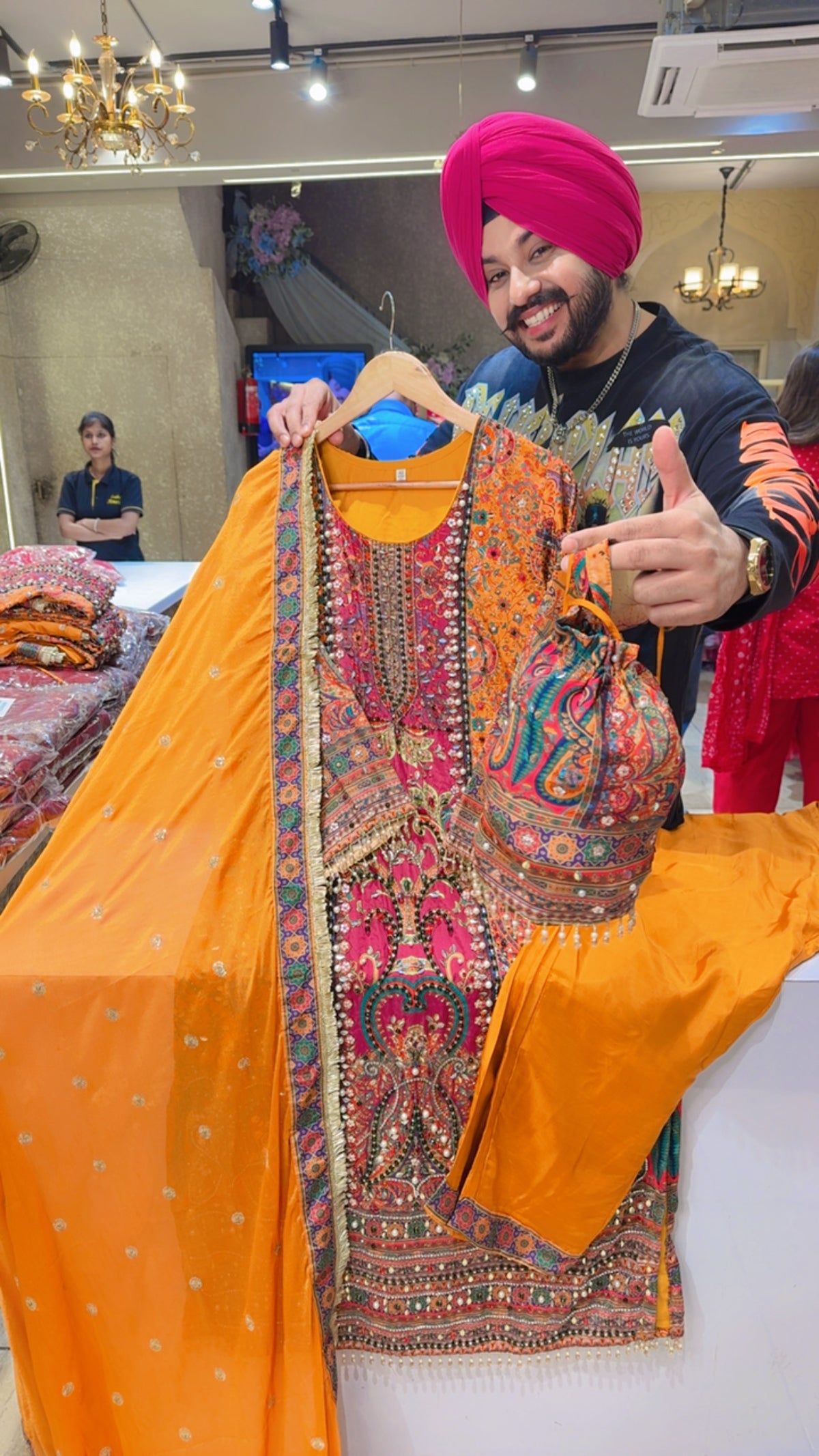 Mustard Yellow Crepe Heavy Hand embroidered & Pearl Pasting Long Length Suit with Cute Potli