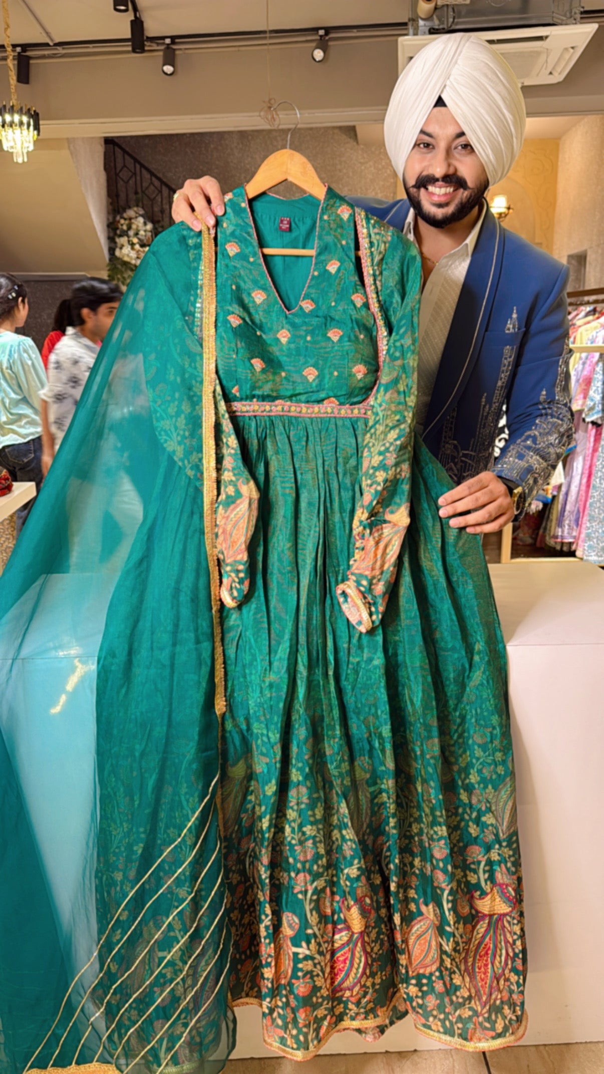 Leaf Green Soft Shimmer Silk Padded Girlish Anarkali Gown with Hand Embroidery work on neck