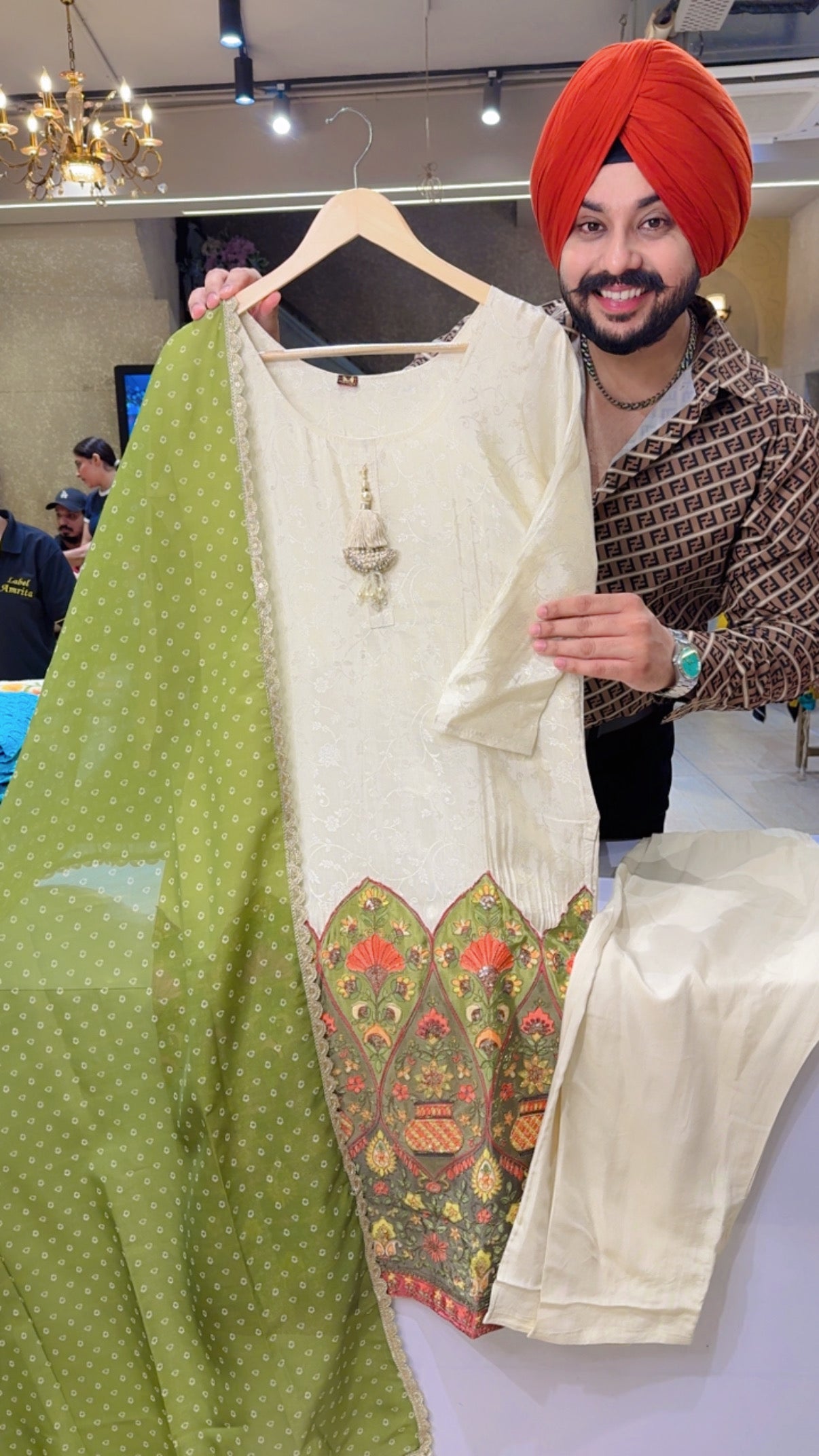 Green & Goldnish Cream Jaquard Silk Heavy Embroidered Border Party Wear Straight suit