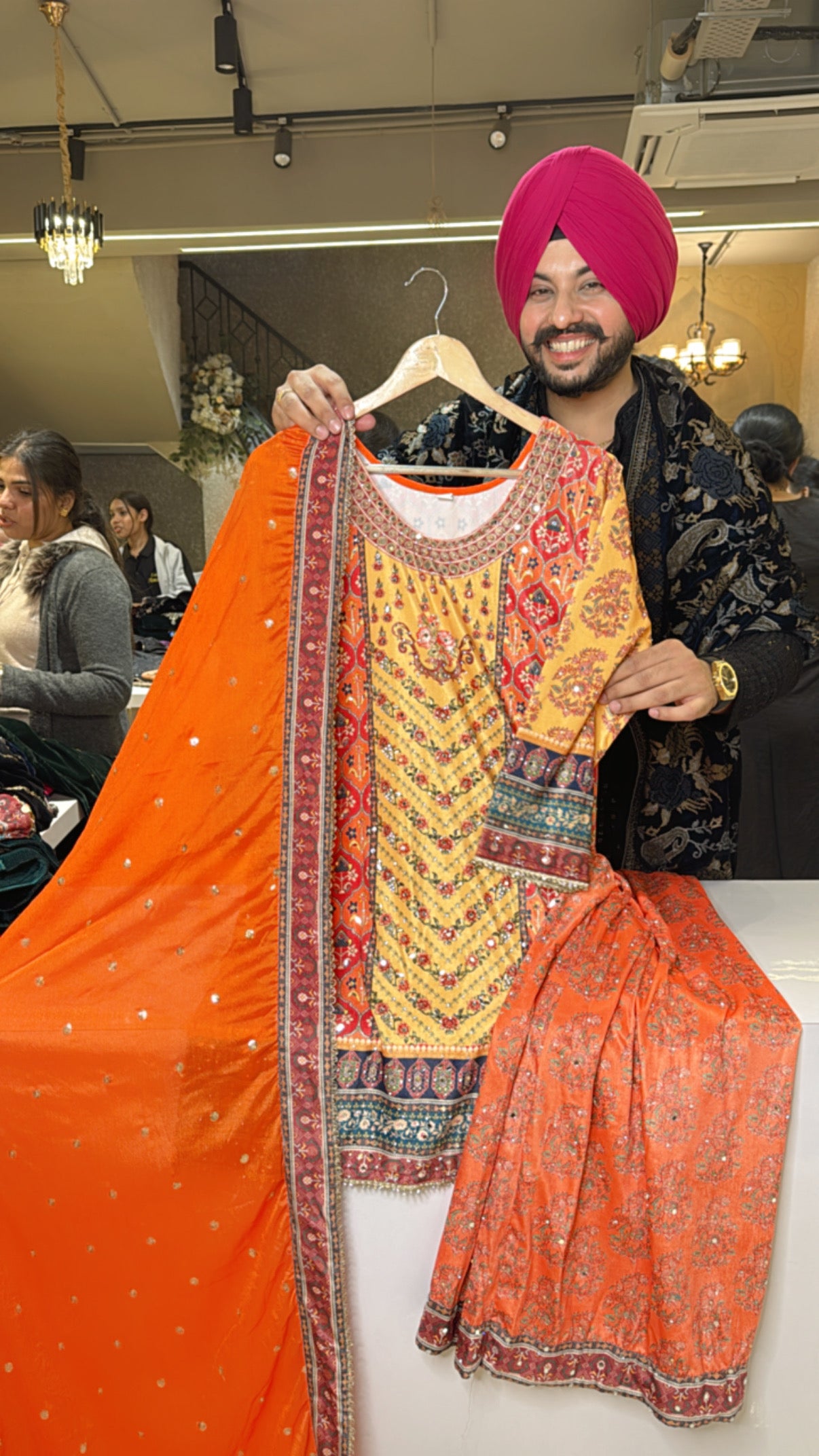Vibrant Orange Velvet Heavy mirror Pasting Indo Western Pakistani Plazo suit with Potli