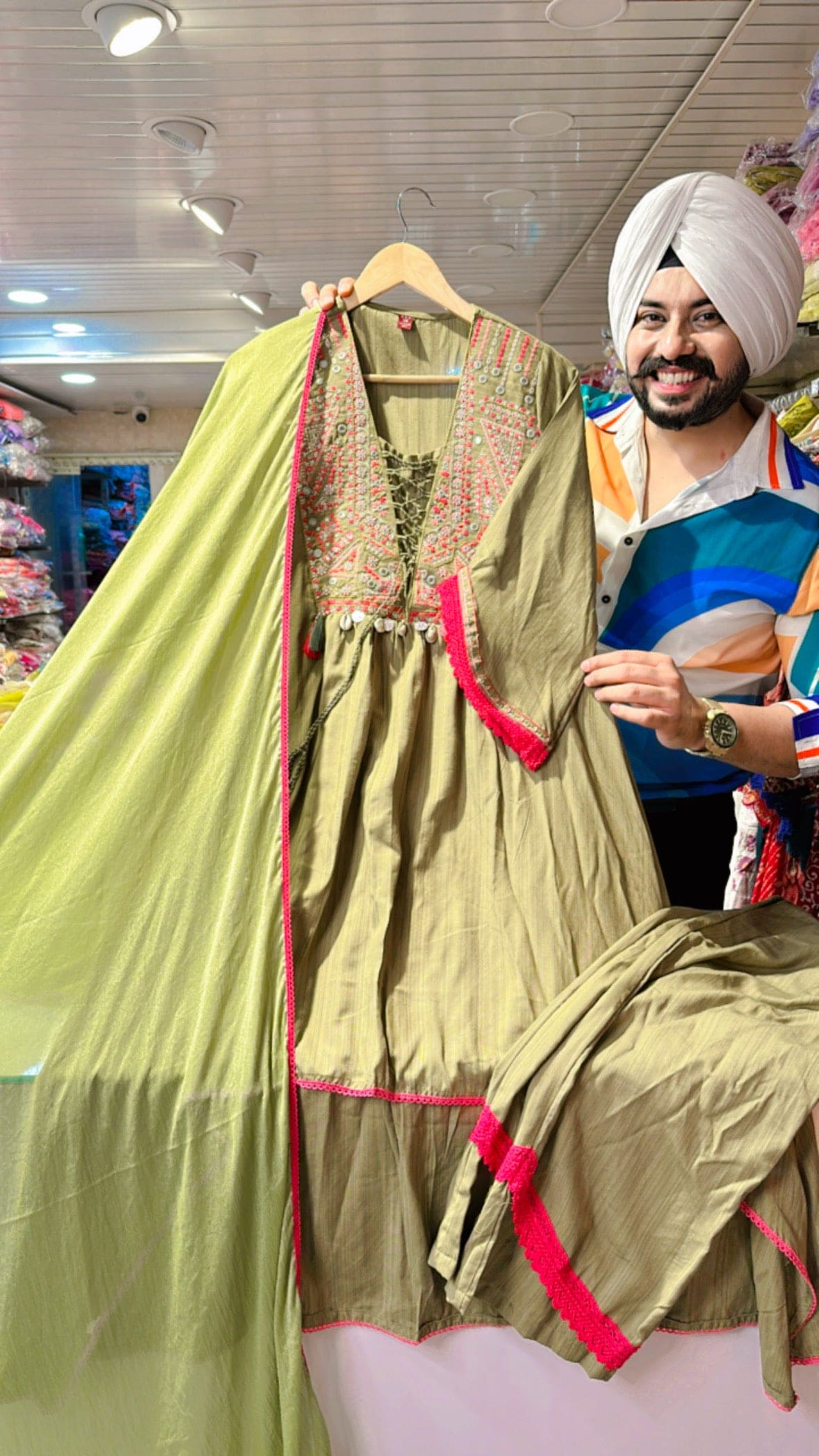 Green Indo western High-Low suit with beautiful Embroidery work on neck