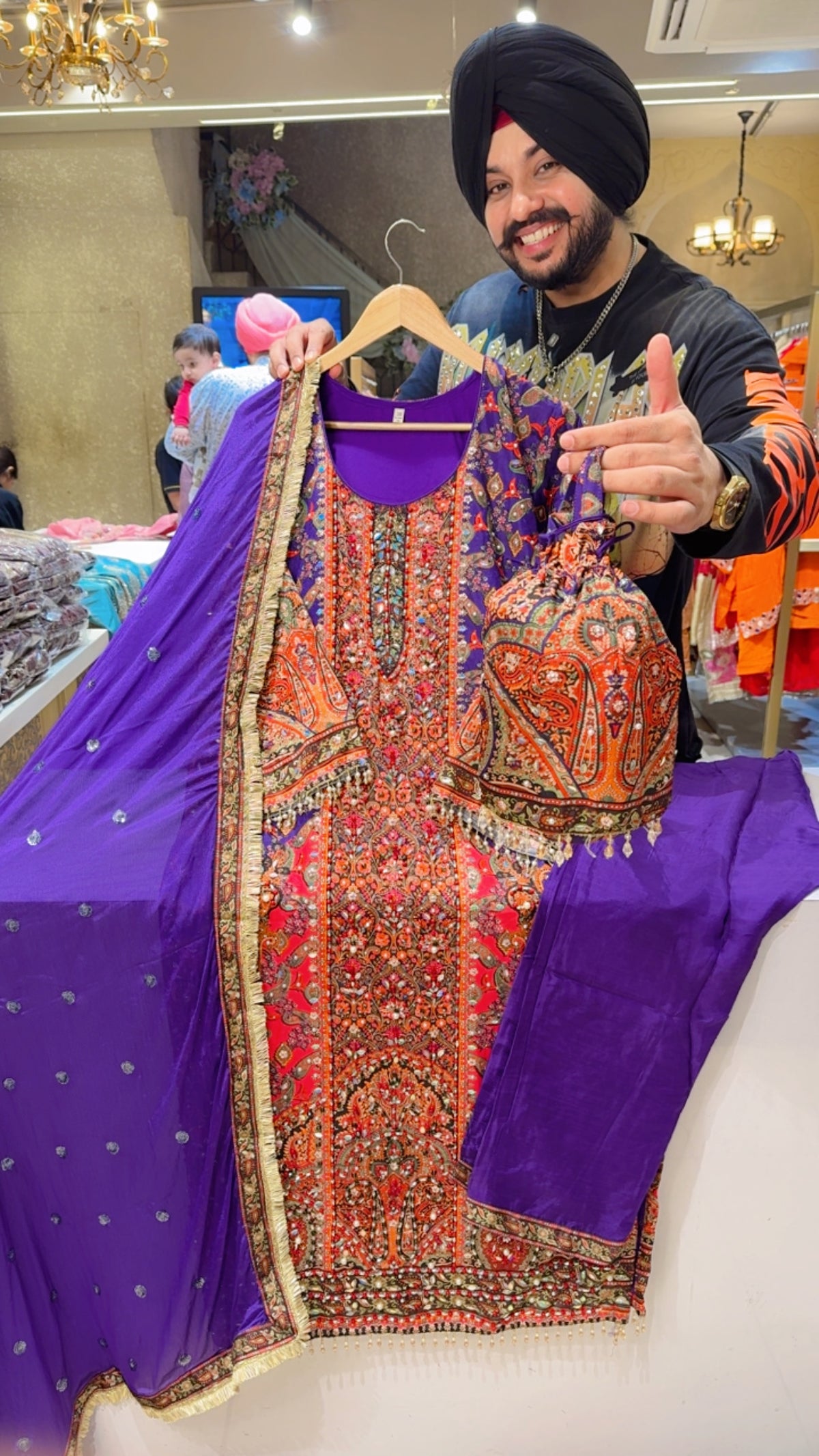 Purple Crepe Heavy Hand embroidered & Pearl Pasting Long Length Suit with Cute Potli