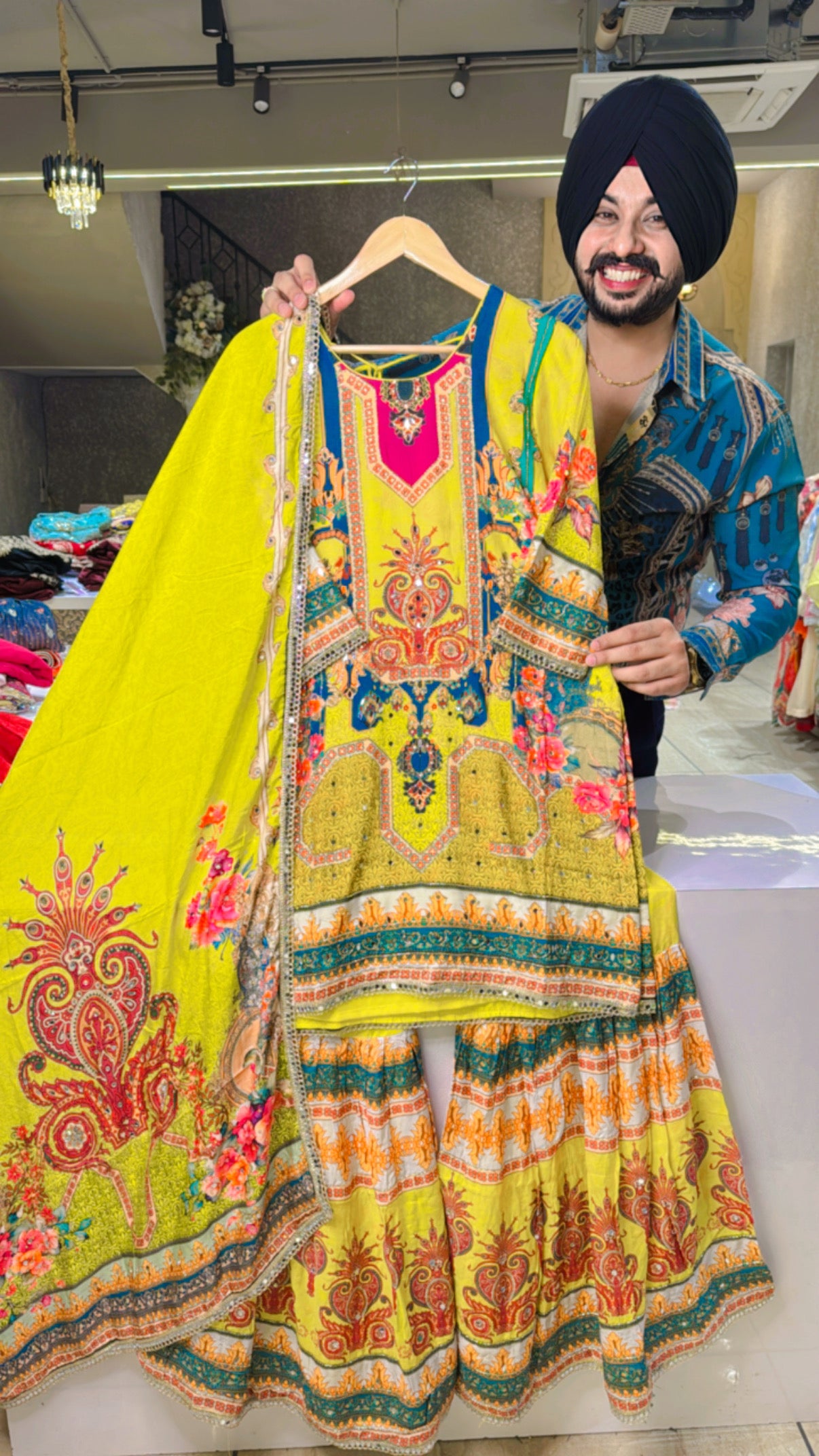 Florescent Muslin Silk Hand Embroidered Full Flair Garara Set