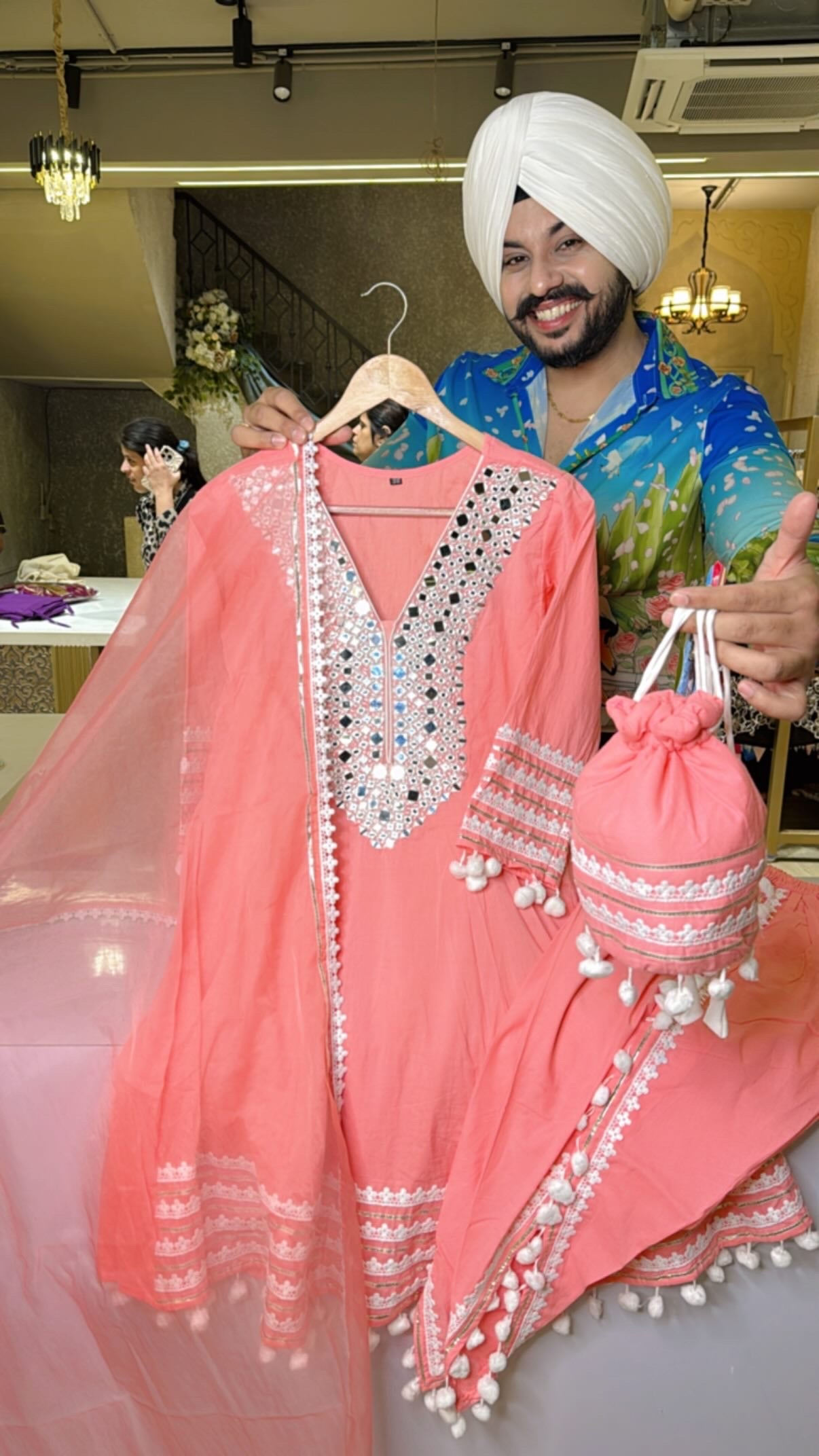 Gajri pink Cotton Heavy Mirror Work Pom-Pom Paplum Dhoti Suit with Cure Potli