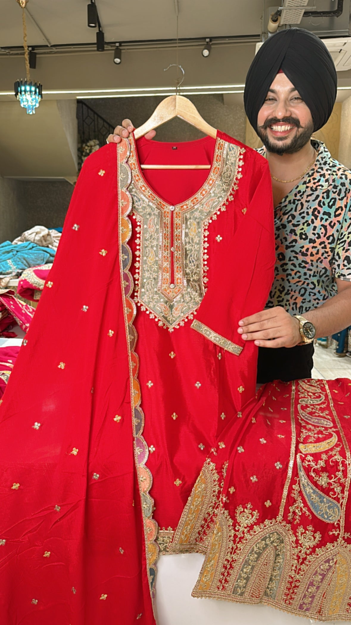 Vibrant Red Chinon Heavy embroidered Full Flair Sharara Suit
