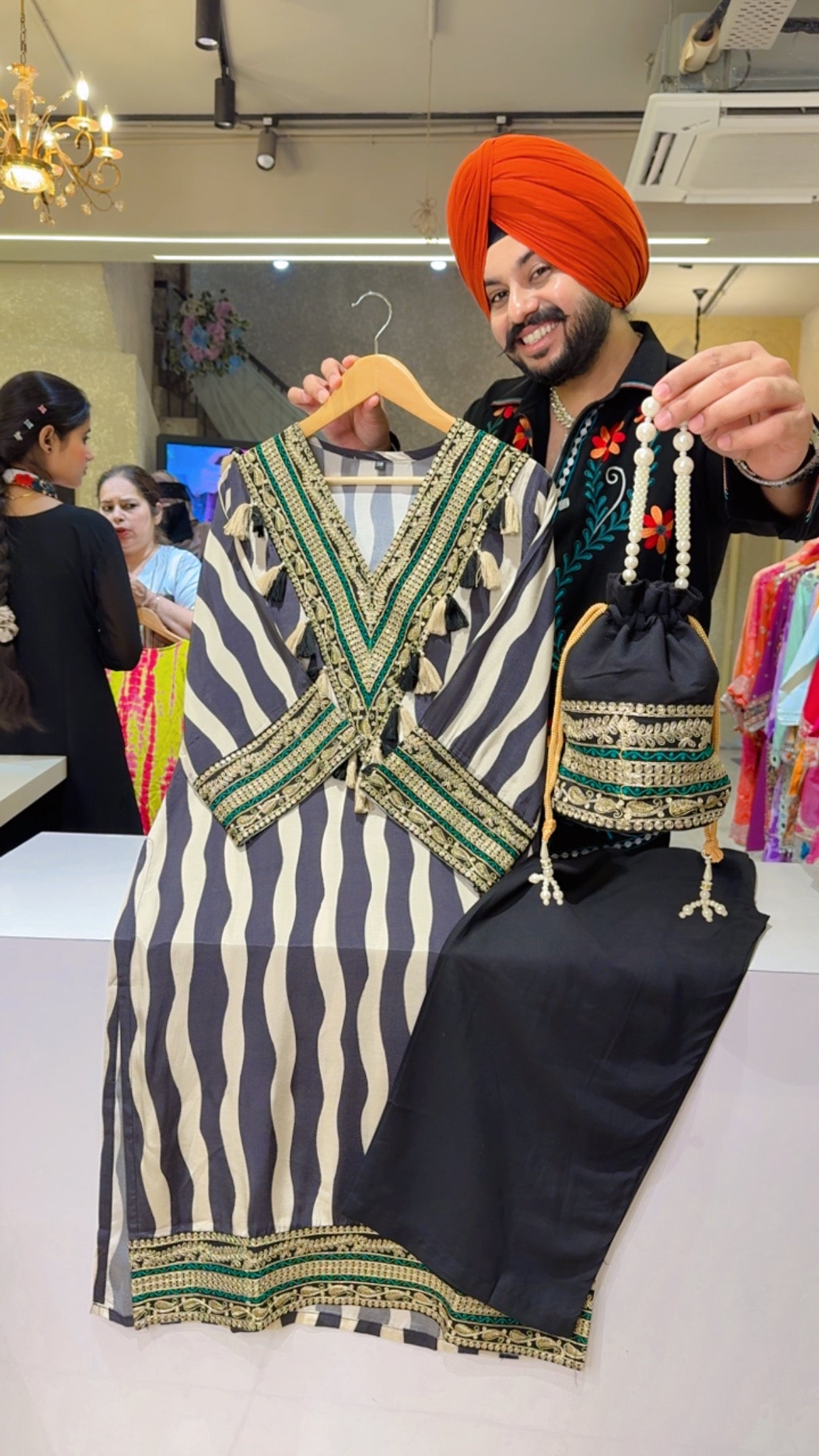 Cream & Black Crepe Lehriya Print Heavy Pakistani Coord set with Beautiful Potli