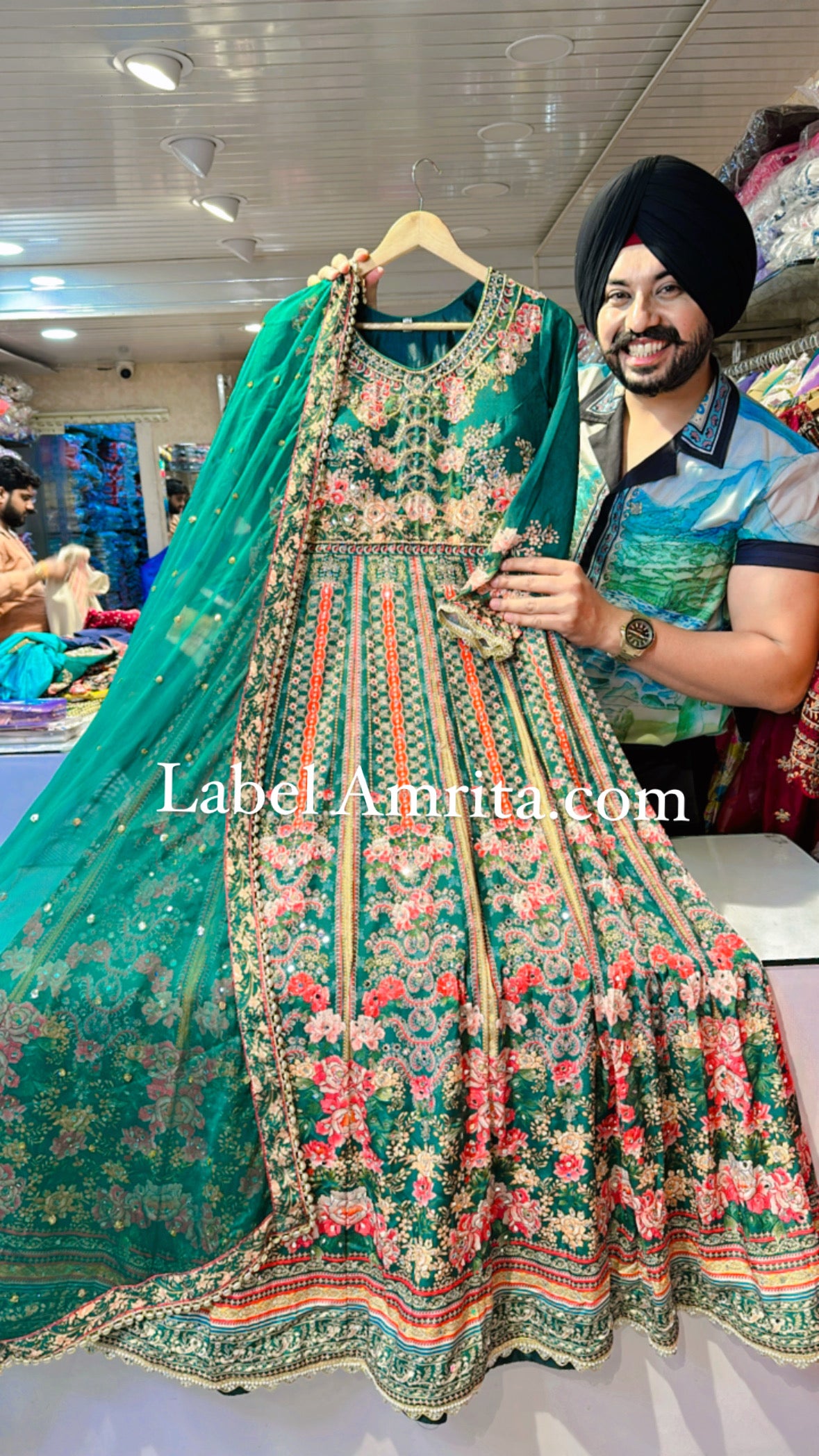 Green Crepe Heavy Anarkali Gown with Hand work on Neck & mirror Pasting All over