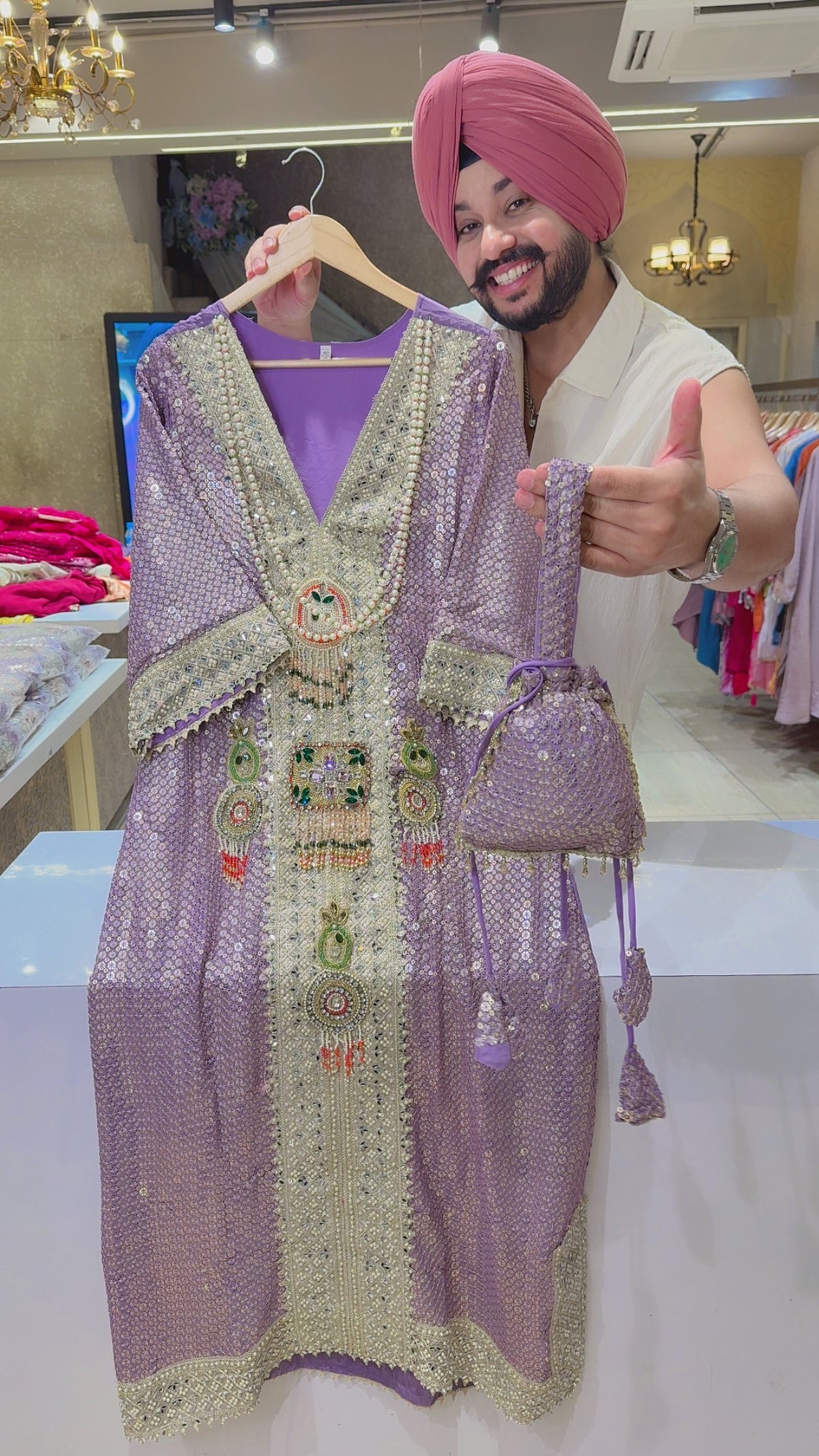 Light Purple Maharani Style Crepe Heavy Kundan Stone & Pearl Work Heavy Phiran Dress with Potli