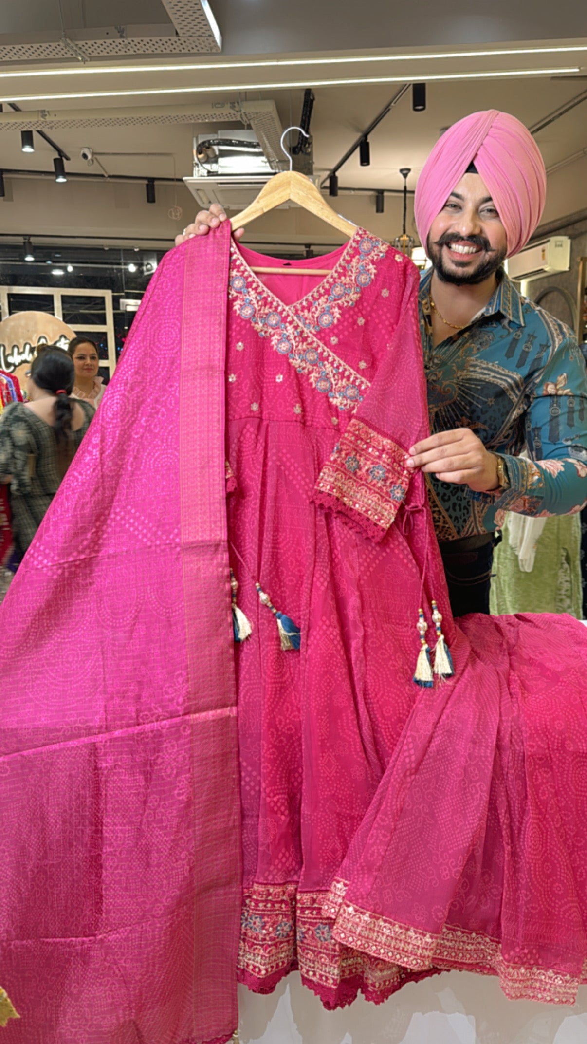 Pink shimmer organza Angrakha Anarkali suit with Sharara