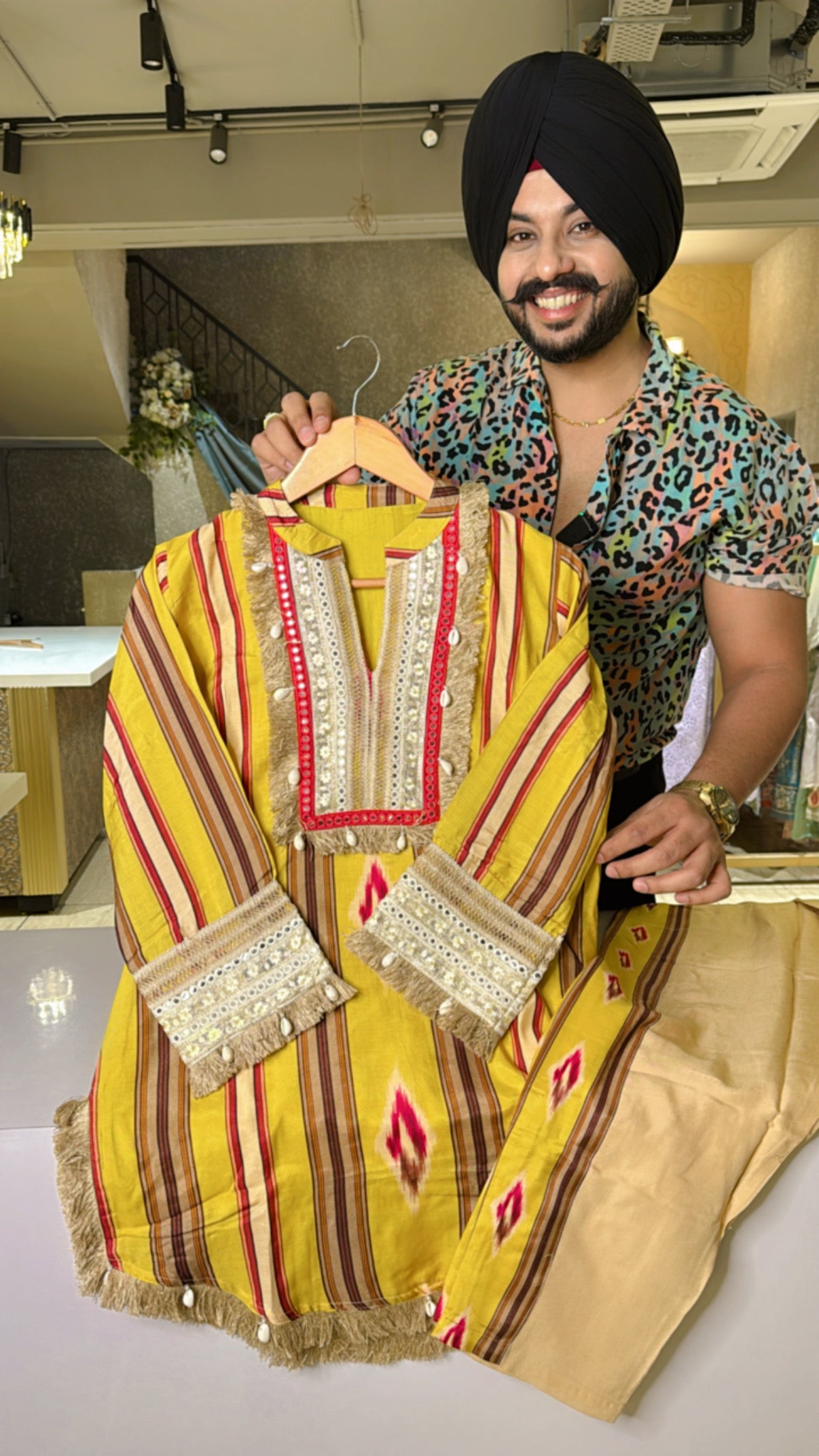 Yellow Muslin Silk Apple Cut Coord set With Beautiful Embroidery & Shell hangings on it