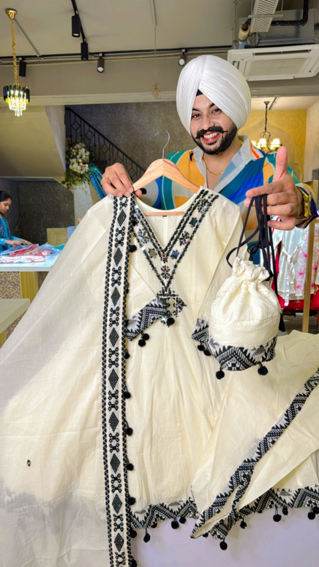 Off white & Black kora Cotton Paplum Dhoti suit with cute Potli