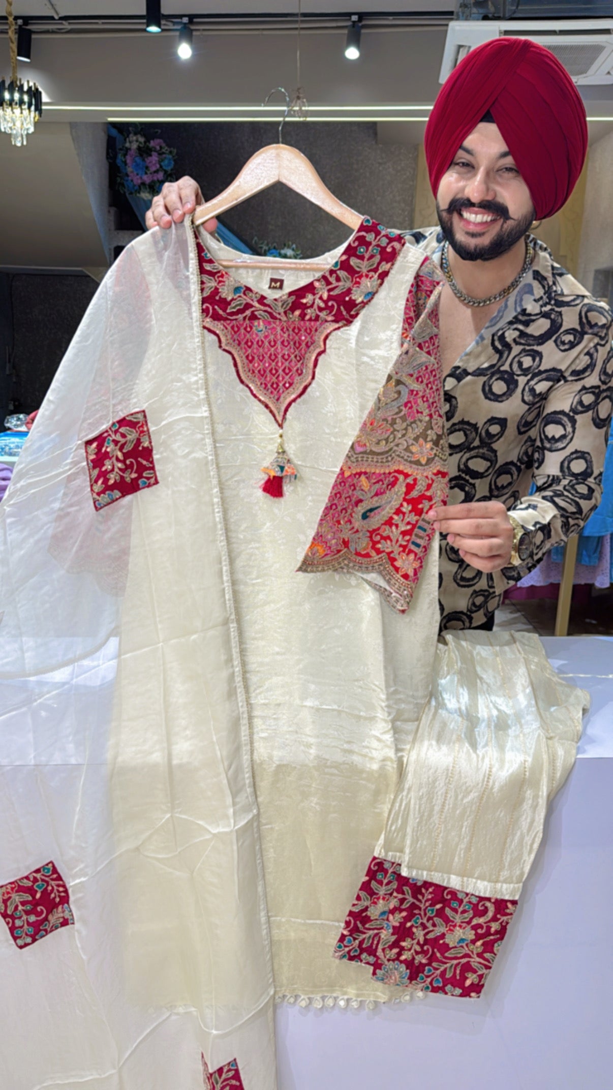 Cream & maroon jacquard Silk Party wear suit with heavy embroidery work on Sleeves, Neck, Pants & Duppata