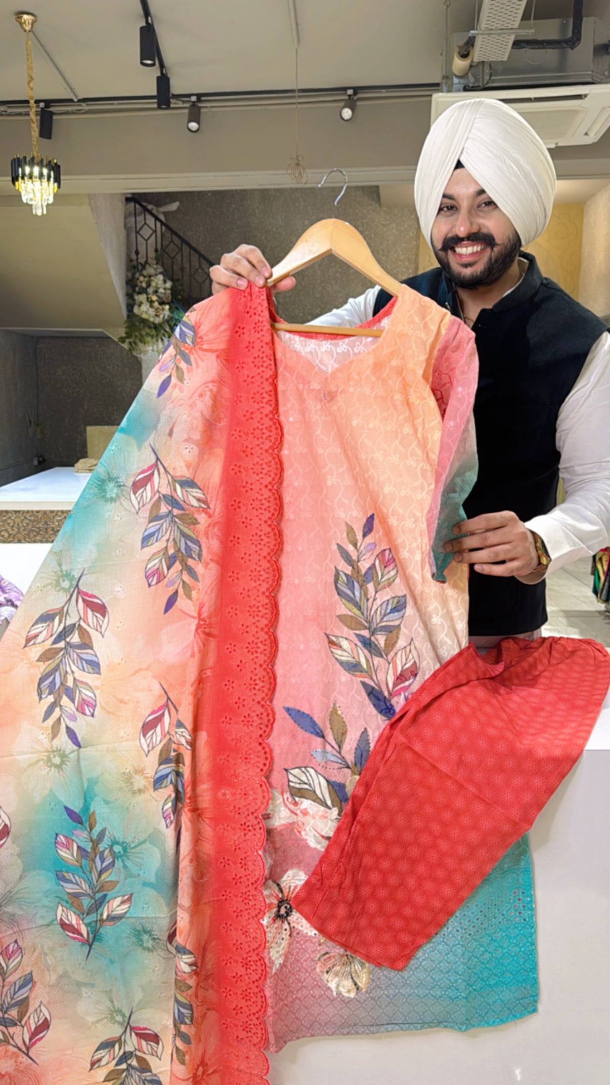 Vibrant Gajri & Multicolored Pure cotton Self embroidered & Sequins Work Straight Suit with Shifi Duppata