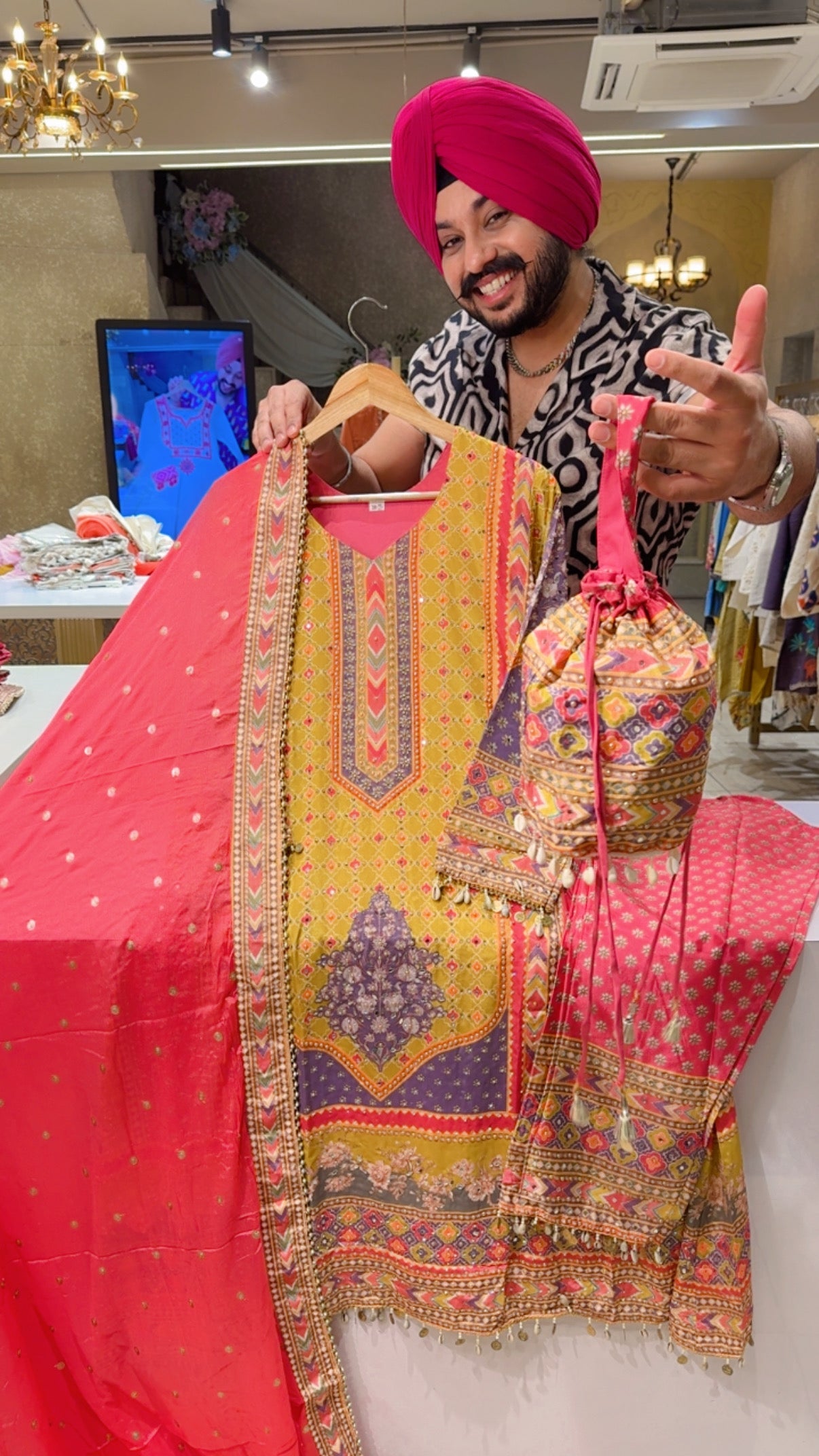 Yellow & Gajri Crepe Heavy Mirror Pasting & Shell Hangings A-line Suit with Cute Potli