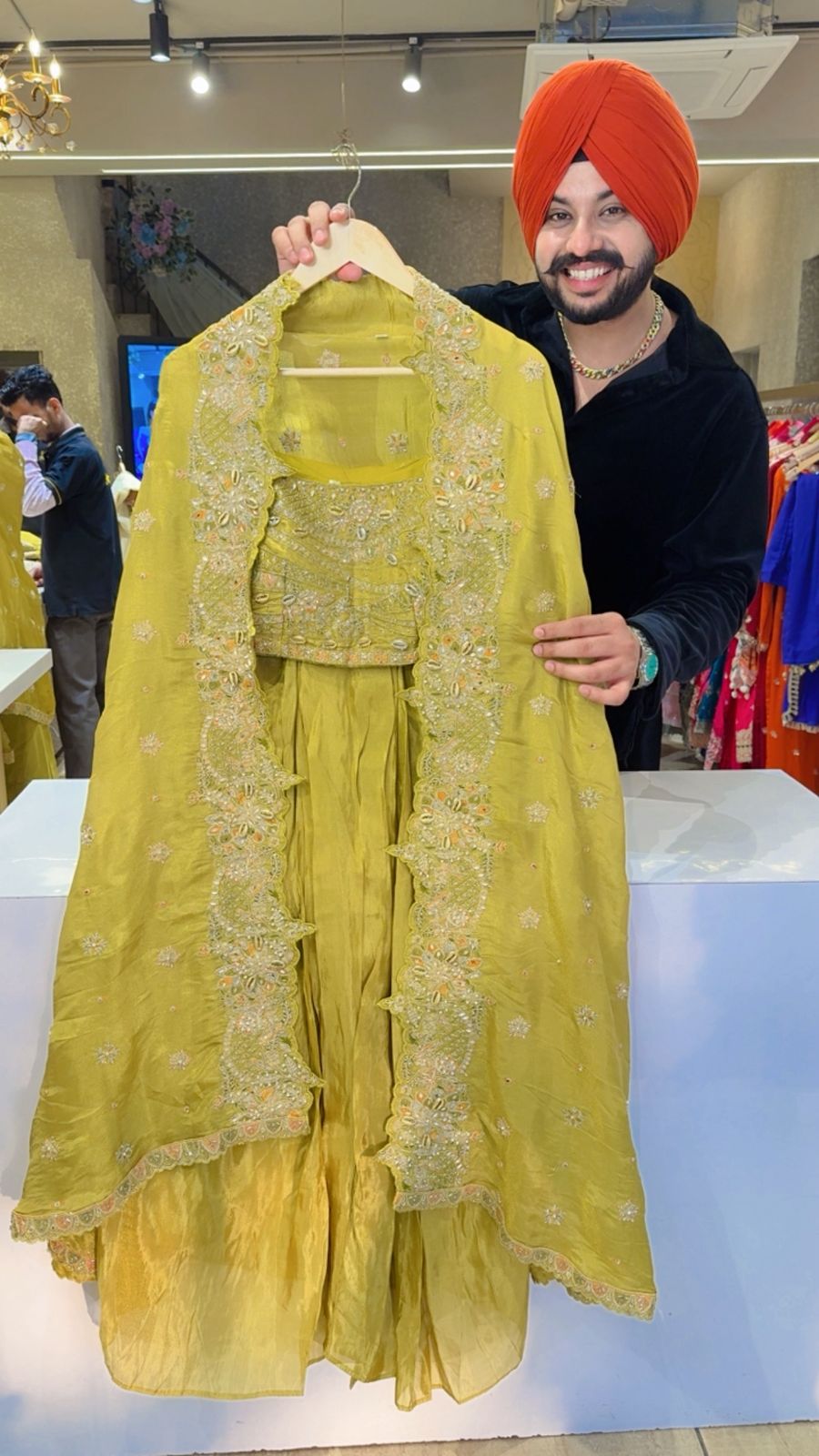 Light mehendi Hand embroidered Drape Crop Set with Heavy embroidered Shrug & Potli