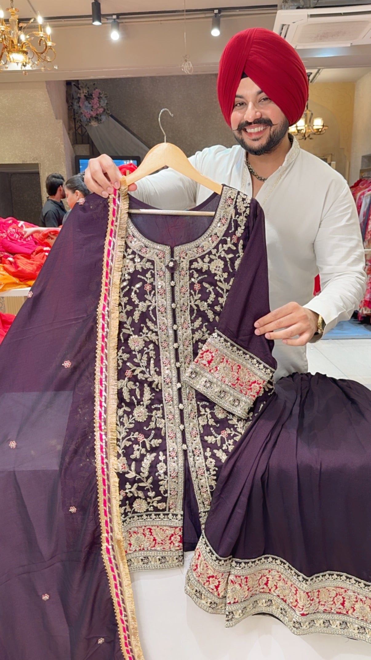 Dark Wine Heavy Embroidered Full Flair Plazo suit with Beautiful Duppata
