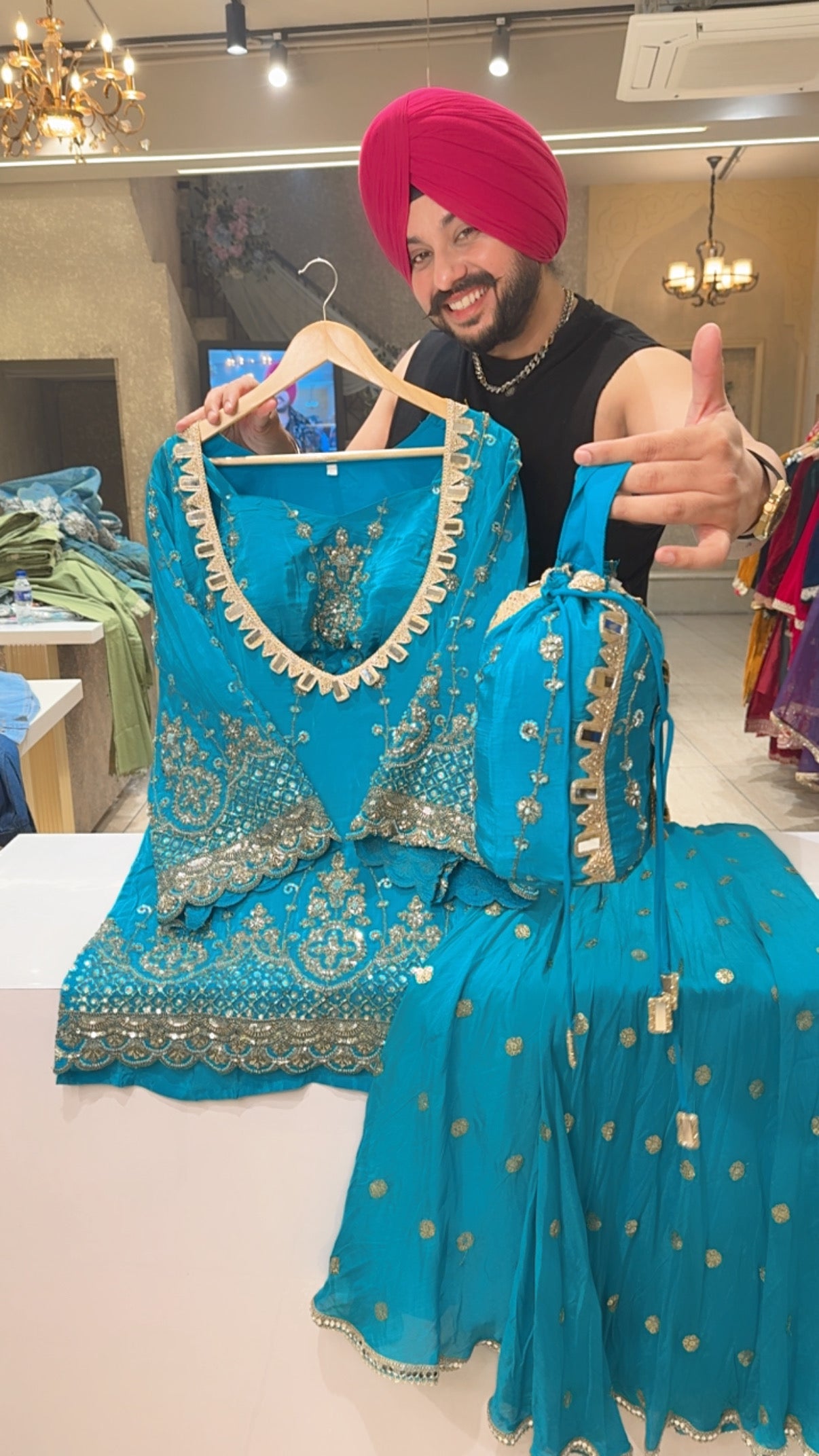 Firozi Crepe Heavy Hand Embroidered Party Wear Bell Bottom Sharara Coord Set with Hand embroidered Bustier & Potli