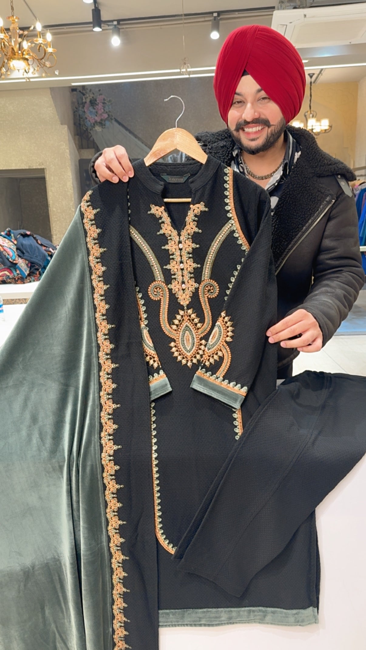 Black woolen embroidered Party Wear Straight Suit with Beautiful Velvet Olive green Embroidered Duppata