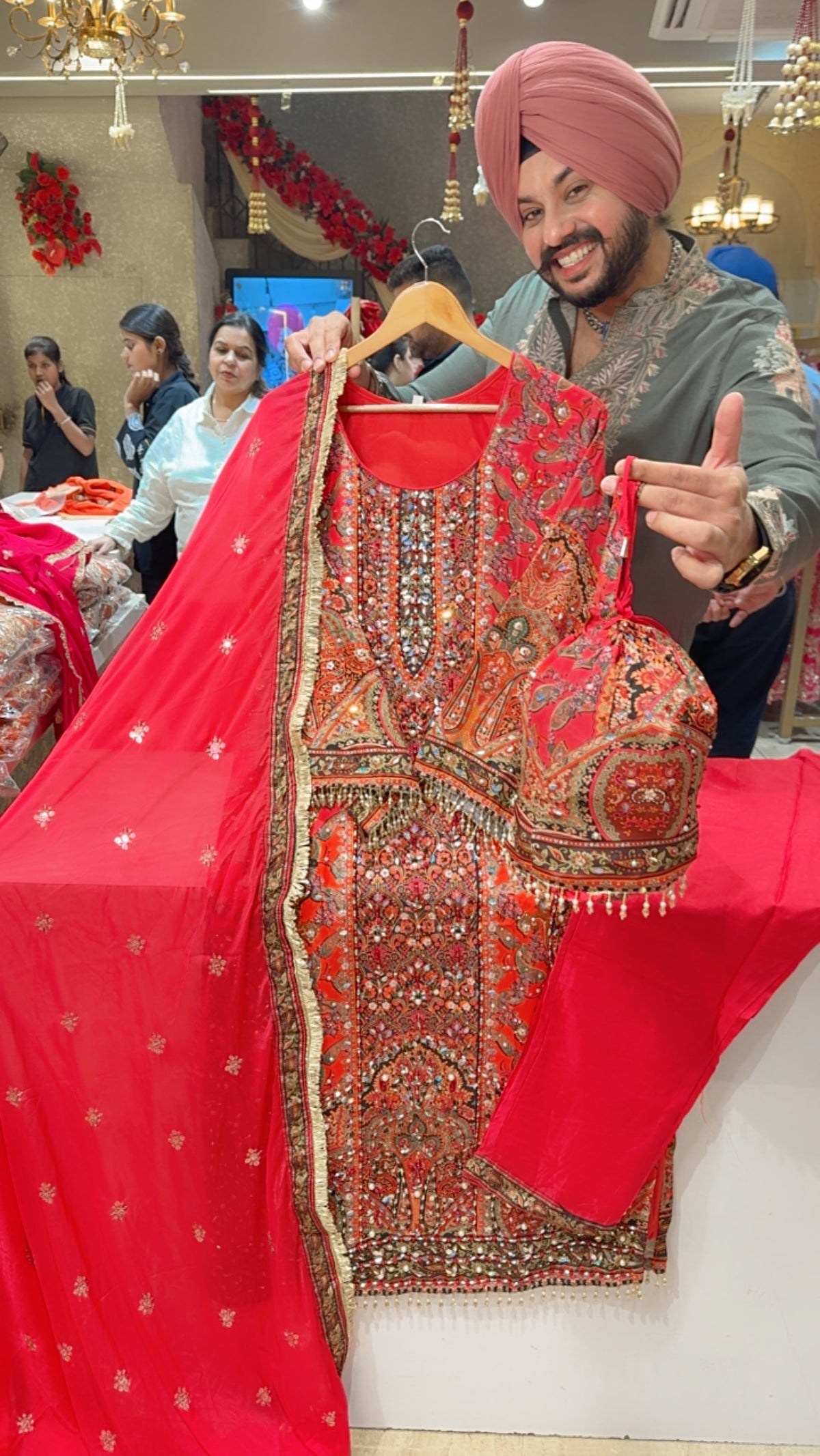 Gajri Crepe Heavy Hand embroidered & Pearl Pasting Long Length Suit with Cute Potli