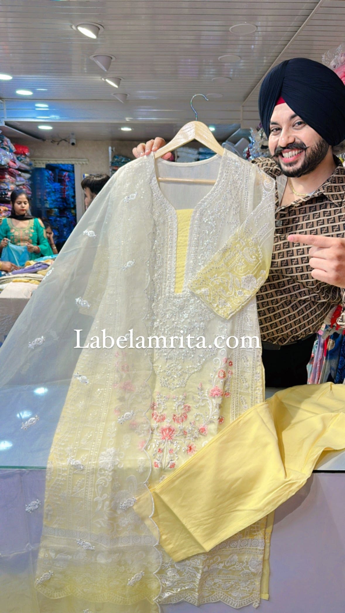 Moonwhite & yellow Organza Pakistani heavy Embroidered Suit