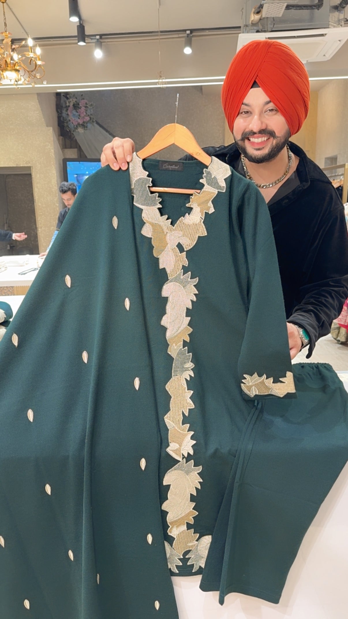 Dark Green Woolen Designer neck Straight Suit with Beautiful Embroidery work On It