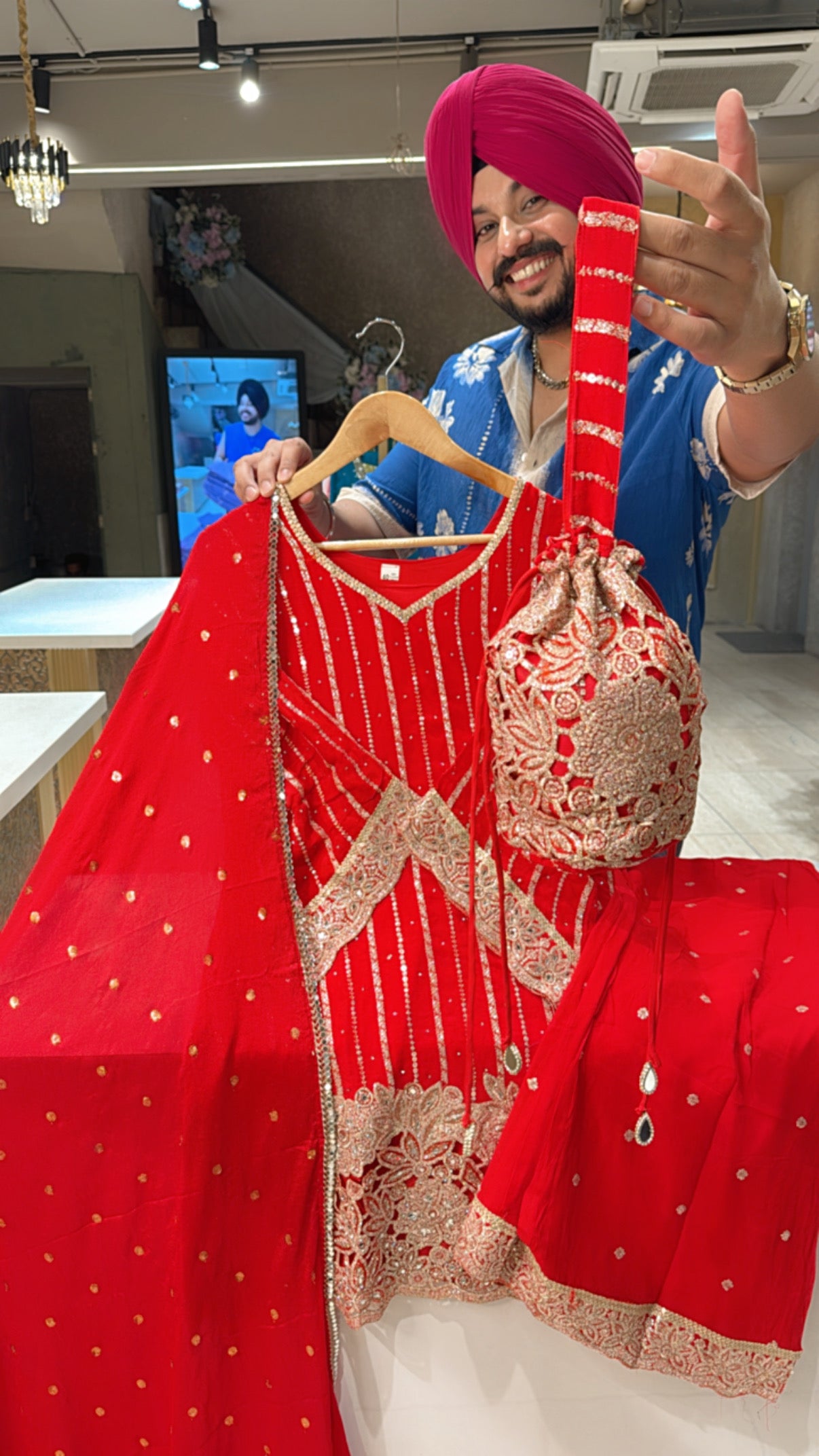Red Georgette Heavy Sequins & Cutwork Bell Bottom Party Wear suit with Designer Sleeves & Potli