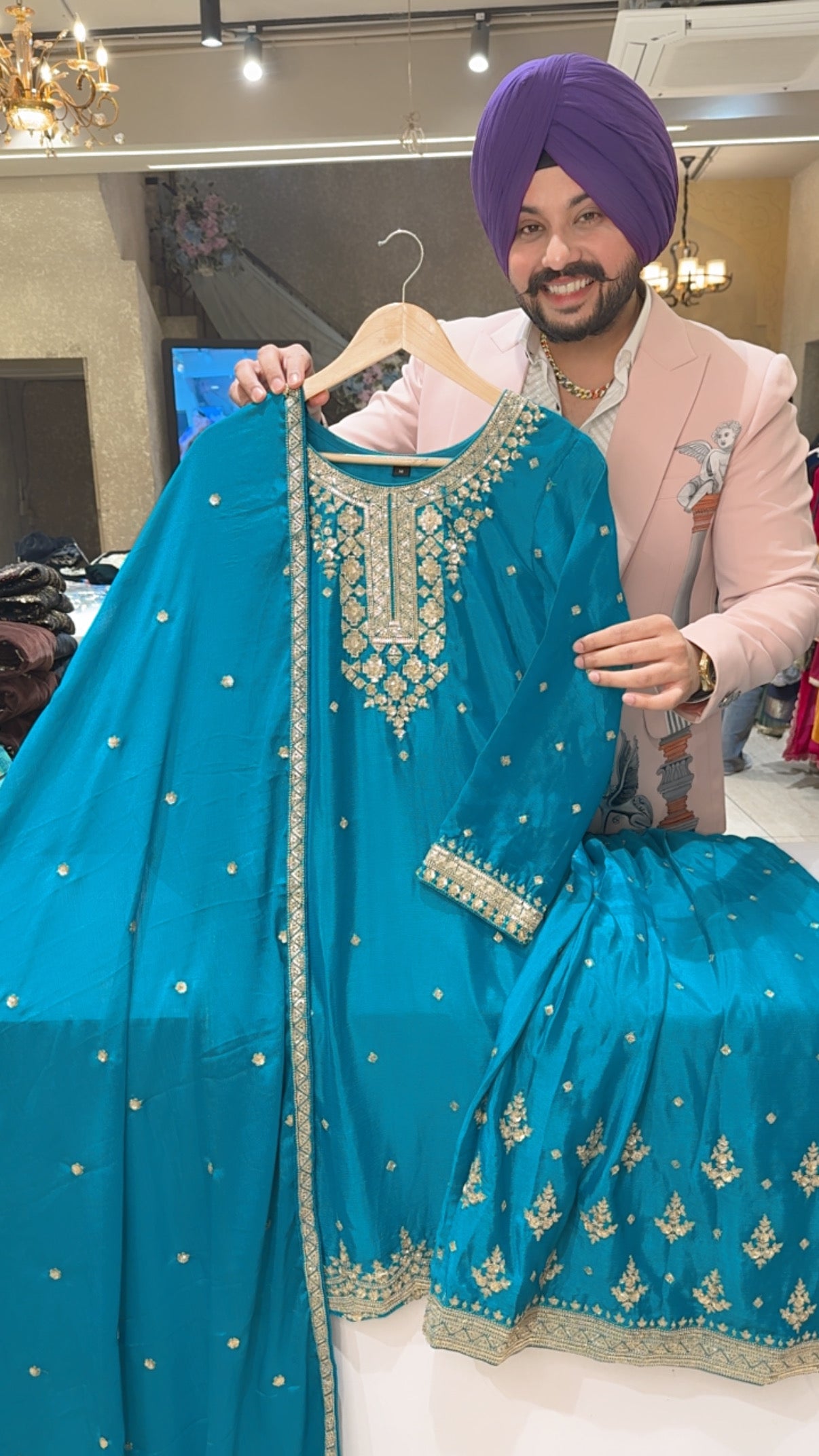 Rama Chinon Heavy embroidered Full Flair Sharara suit with Beautiful Duppata