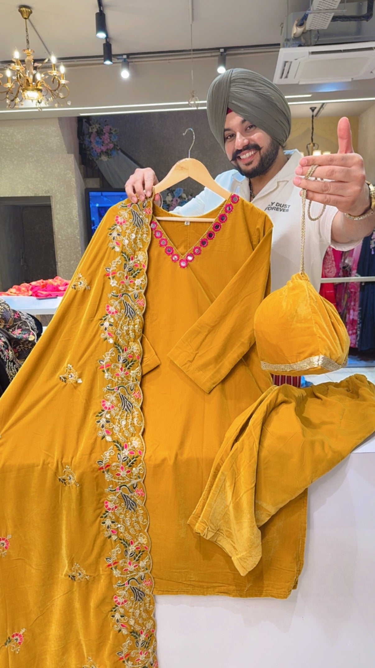 Mustard yellow Velvet Party Wear Suit with Heavy embroidered Duppata & Cute Potli