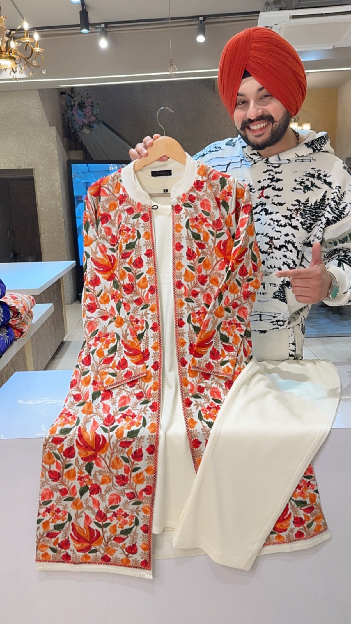 Moon White Woolen Long length Coord set With Heavy Embroidered Shrug