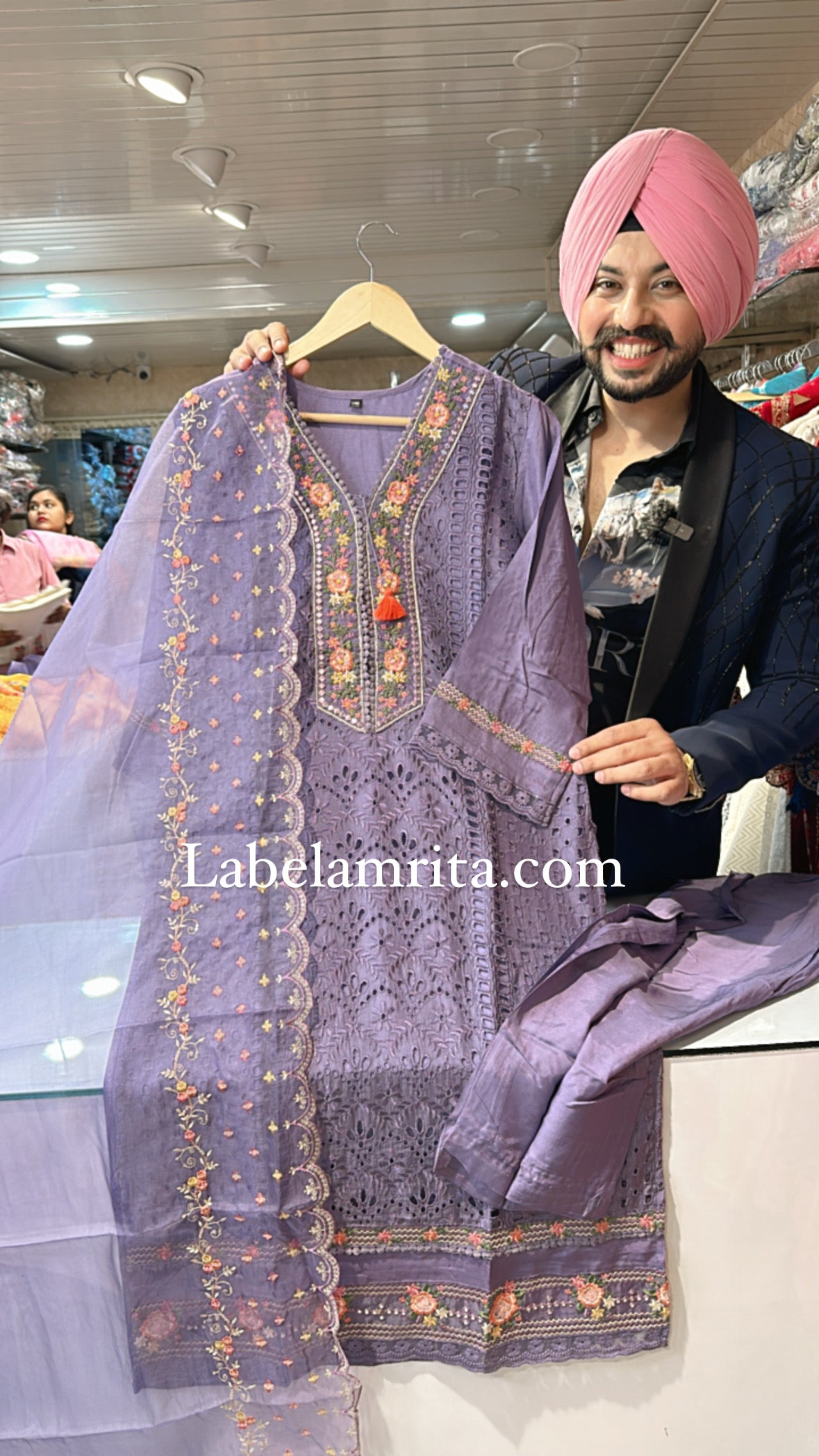 Purple Muslin silk Embroidered Pakistani suit with Beautiful Organza Duppata