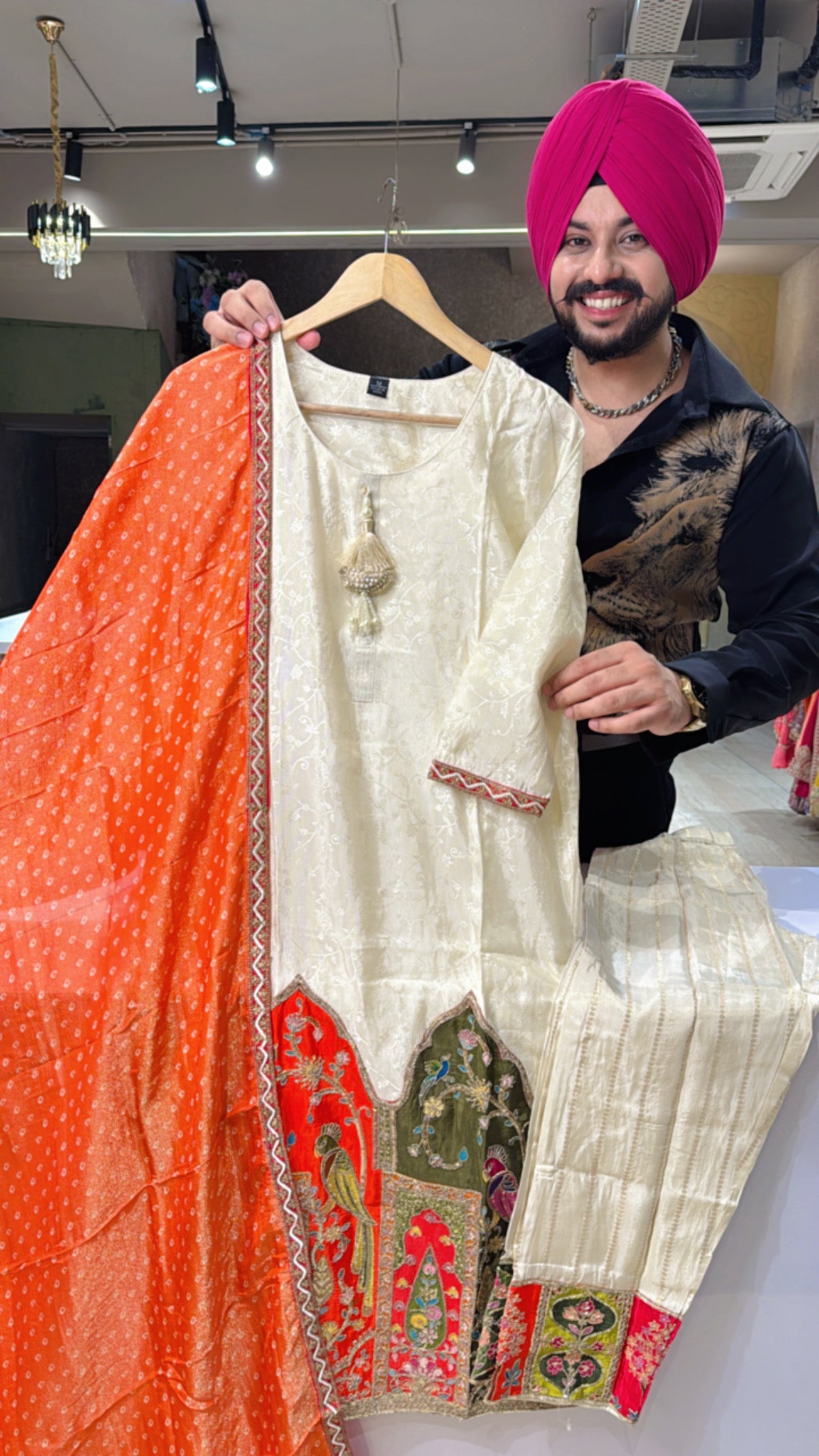 Ivory colour Jacquard silk Heavy embroidered Straight Suit with Orange Bandhej Duppata